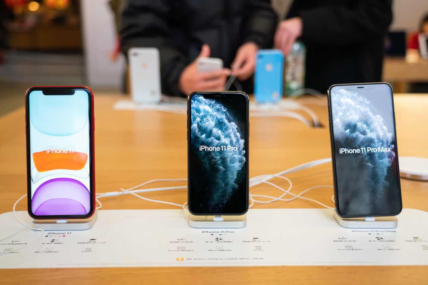 iPhone 11 series smartphones seen in an Apple retail store in Shanghai.