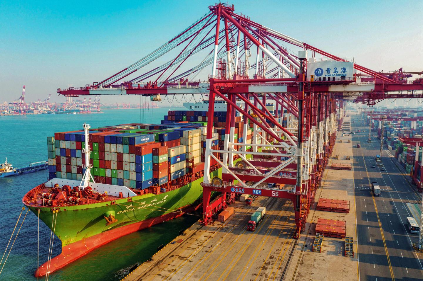 A cargo ship loaded with containers berths at a port in Qingdao in China's eastern Shandong province on January 14, 2020. - China's trade surplus with the United States narrowed last year as the world's two biggest economies exchanged punitive tariffs in a bruising trade war, official data showed on January 14, on the eve of a deal to ease tensions. (Photo by STR / AFP) (Photo by STR/AFP via Getty Images)