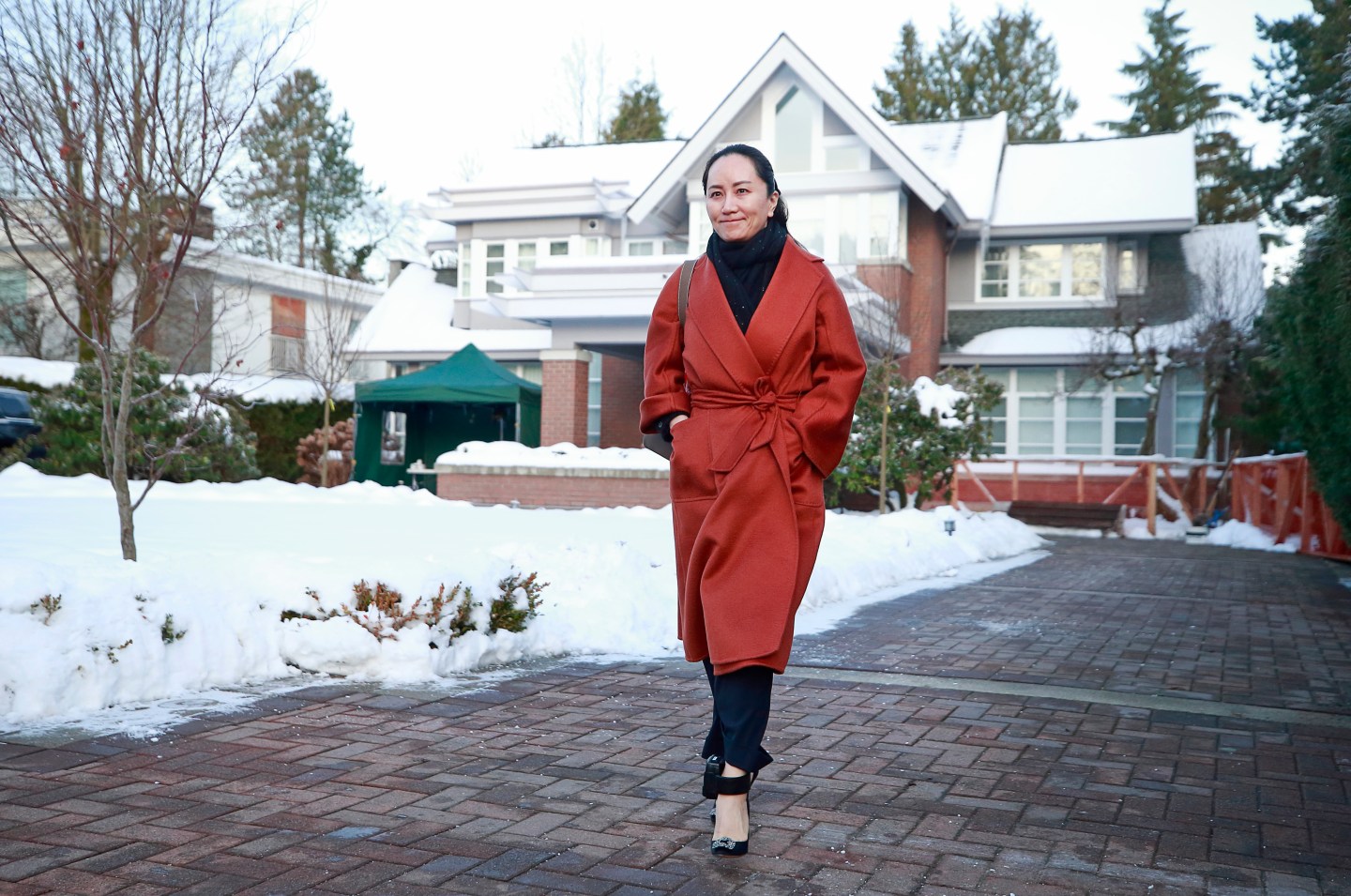 VANCOUVER, BC - JANUARY 17: Huawei Technologies Chief Financial Officer Meng Wanzhou leaves her house on her way to a court appearance on January 17, 2020 in Vancouver, Canada. The United States government accused Wanzhou of fraud after HSBC continued trade with Iran while sanctions were in place. (Photo by Jeff Vinnick/Getty Images)