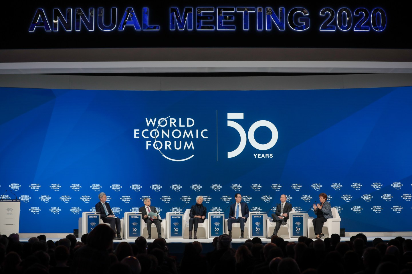 From left to right, Zhu Min, deputy managing director of the International Monetary Fund (IMF), Haruhiko Kuroda, governor of the Bank of Japan (BOJ), Christine Lagarde, president of the European Central Bank (ECB), Steven Mnuchin, U.S. Treasury secretary, Olaf Scholz, Germany's finance minister, and Kristalina Georgieva, managing director of the International Monetary Fund (IMF), attend a panel session on the closing day of the World Economic Forum (WEF) in Davos, Switzerland, on Friday, Jan. 24, 2020.