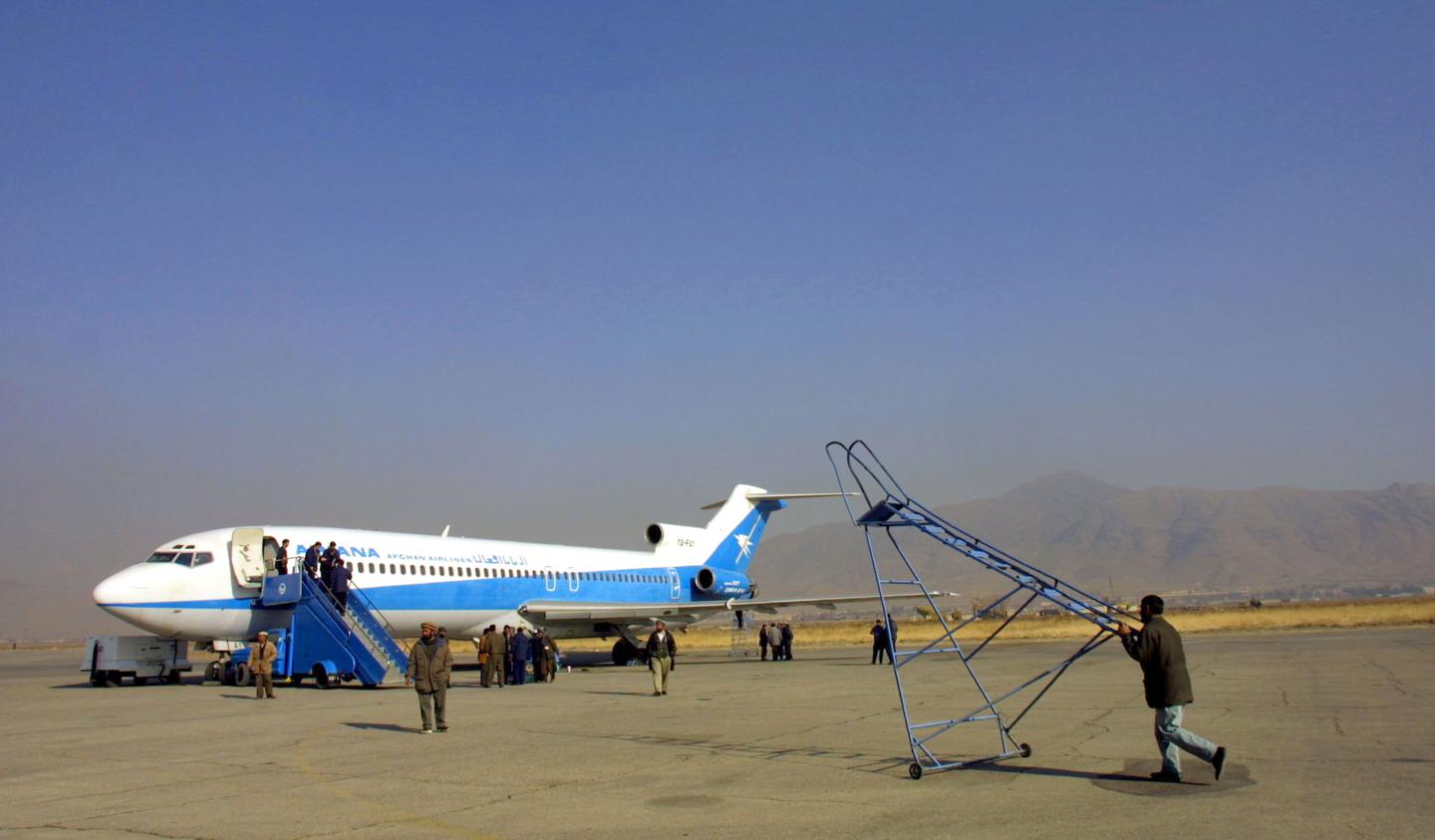 400053 09: An Ariana Afghan Airlines plane is readied for the airlines'' first international flight in five years January 24, 2002 at Kabul Airport in Kabul, Afghanistan. The flight from Kabul to New Delhi took 24 passengers. (Photo by Paula Bronstein/Getty Images)