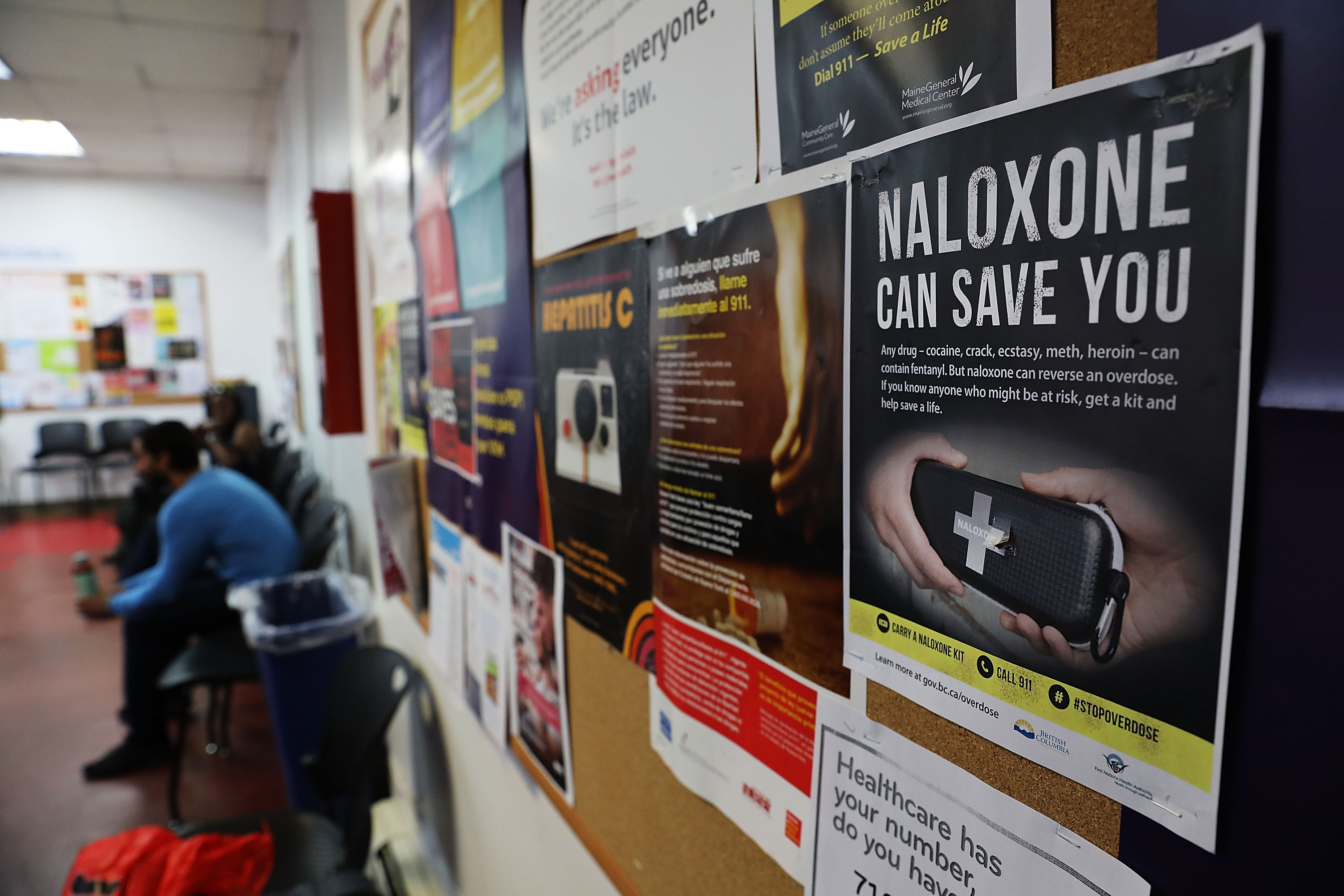 A sign for Naloxone hangs on a wall  in a class on opioid overdose prevention held by non-profit Positive Health Project on August 9, 2017 in New York City. The weekly class offers individuals free training with Naloxone and everyone receives an overdose kit on completion of the hour course. According to the National Institute on Drug Abuse, nearly 35,000 people across America died of heroin or opioid overdoses in 2015.  (Photo by Spencer Platt/Getty Images)