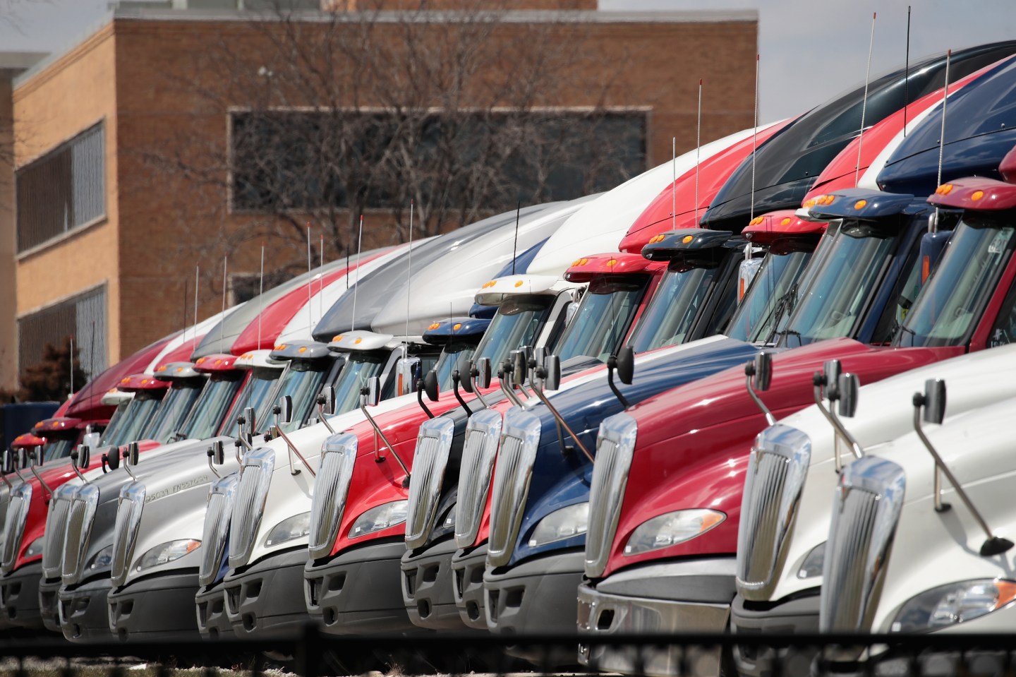 MELROSE PARK, IL - APRIL 17: International trucks are parked in a lot outside of a Navistar facility on April 17, 2018 in Melrose Park, Illinois. Volkswagen AGs commercial-vehicles unit is considering a takeover of Navistar which builds International trucks. (Photo by Scott Olson/Getty Images)
