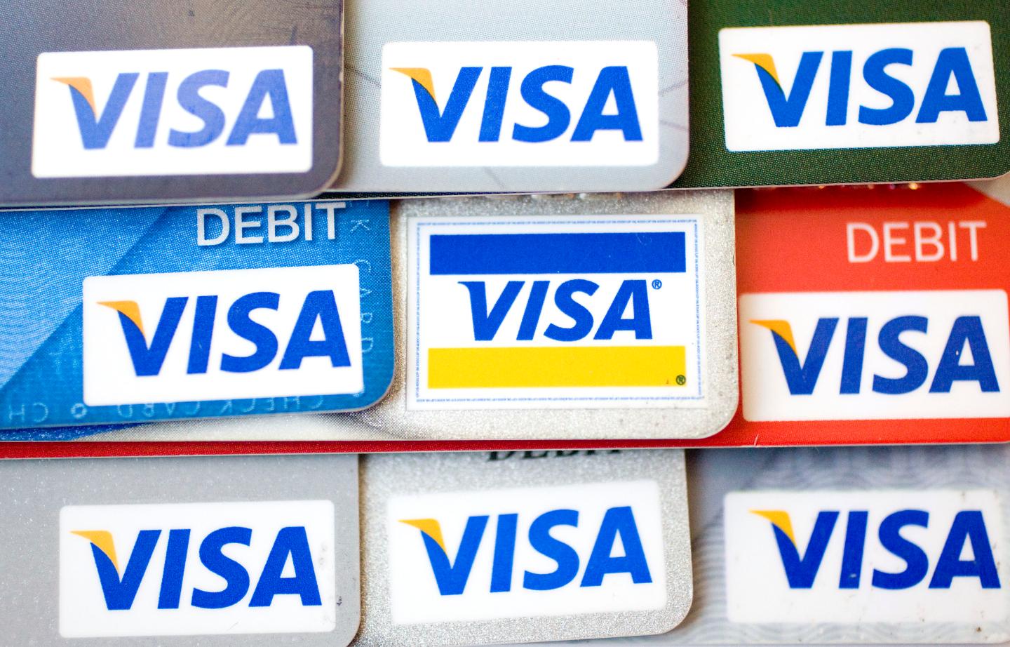Visa logos appear on credit and debit cards