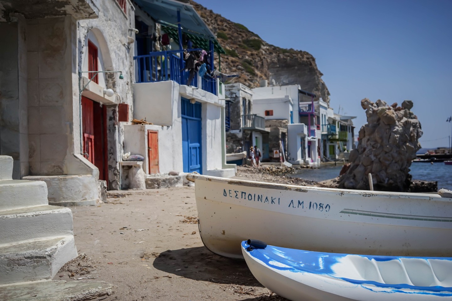 Yachts and sailboats convene among various beaches and coves only reachable by water, and often times ladders dangling from cliffsides.