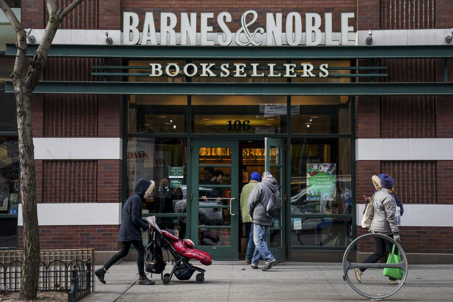 NEW YORK, NY - JANUARY 10: People walk by a Barnes & Noble bookstore, January 10, 2019 in the Brooklyn borough of New York City. On Thursday, Barnes & Noble Inc. cautioned investors that it could reduce its earnings guidance by up to 10 percent due to advertising spending and promotional activity. (Photo by Drew Angerer/Getty Images)