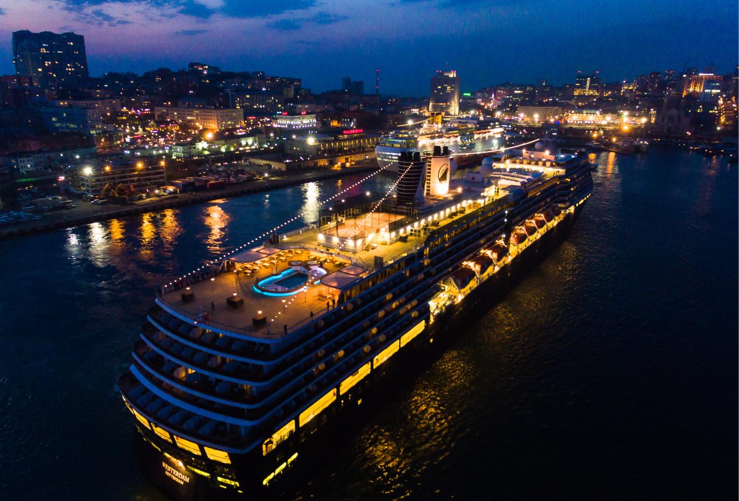 VLADIVOSTOK, RUSSIA - APRIL 22, 2019: The Westerdam cruise ship (front) operated by Holland America Line unberthing at the port of Vladivostok on Russia's Pacific coast. Yuri Smityuk/TASS (Photo by Yuri SmityukTASS via Getty Images)