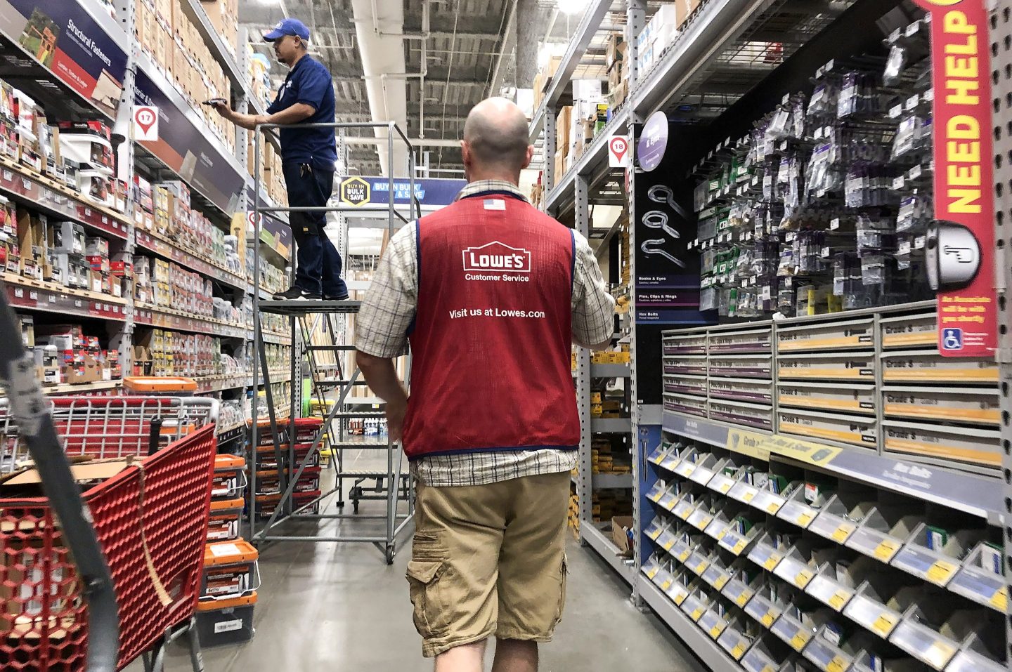 LOS ANGELES, CALIFORNIA - AUGUST 02: Employees work inside a Lowe's store on August 2, 2019 in Los Angeles, California. The home Improvement retailer is set to lay off thousands of workers in an effort to boost profits.