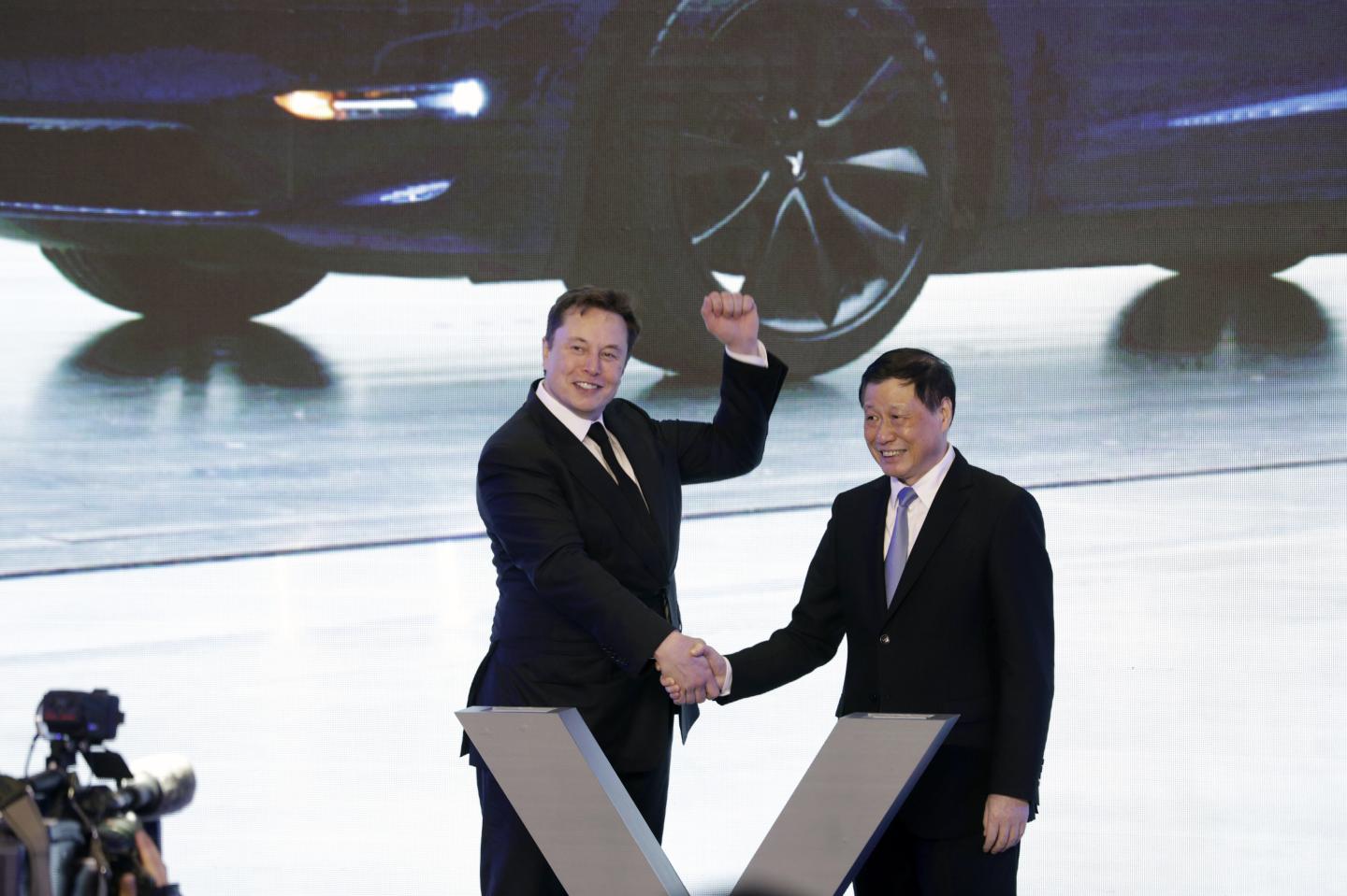 Tesla CEO Elon Musk and Ying Yong, then mayor of Shanghai, during the Tesla China-Made Model 3 Delivery Ceremony in Shanghai, China, on Jan. 7, 2020. Ying, 62, was appointed Thursday to the top political post in central Hubei province.