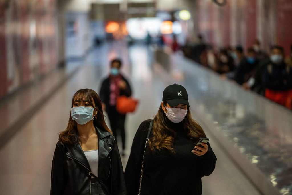 HONG KONG, CHINA - 2020/02/04: Two female seen wearing surgical masks as a preventative measure following the Coronavirus outbreak which began in the Chinese city of Wuhan.
Hong Kong on February 4 became the second place outside mainland China to report the death of a coronavirus patient as officials said they feared local transmissions were increasing in the densely populated city. (Photo by Geovien So/SOPA Images/LightRocket via Getty Images)