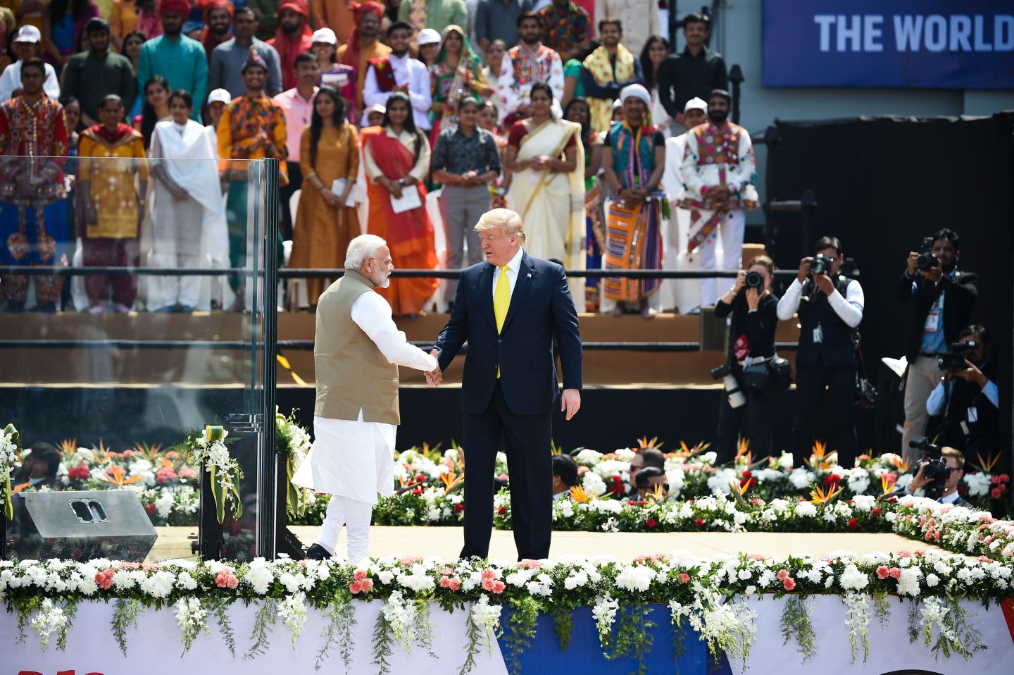 US President Donald Trump (R) shakes hands with India's Prime Minister Narendra Modi during 'Namaste Trump' rally at Sardar Patel Stadium in Motera, on the outskirts of Ahmedabad, on February 24, 2020. (Photo by Money SHARMA / AFP) (Photo by MONEY SHARMA/AFP via Getty Images)