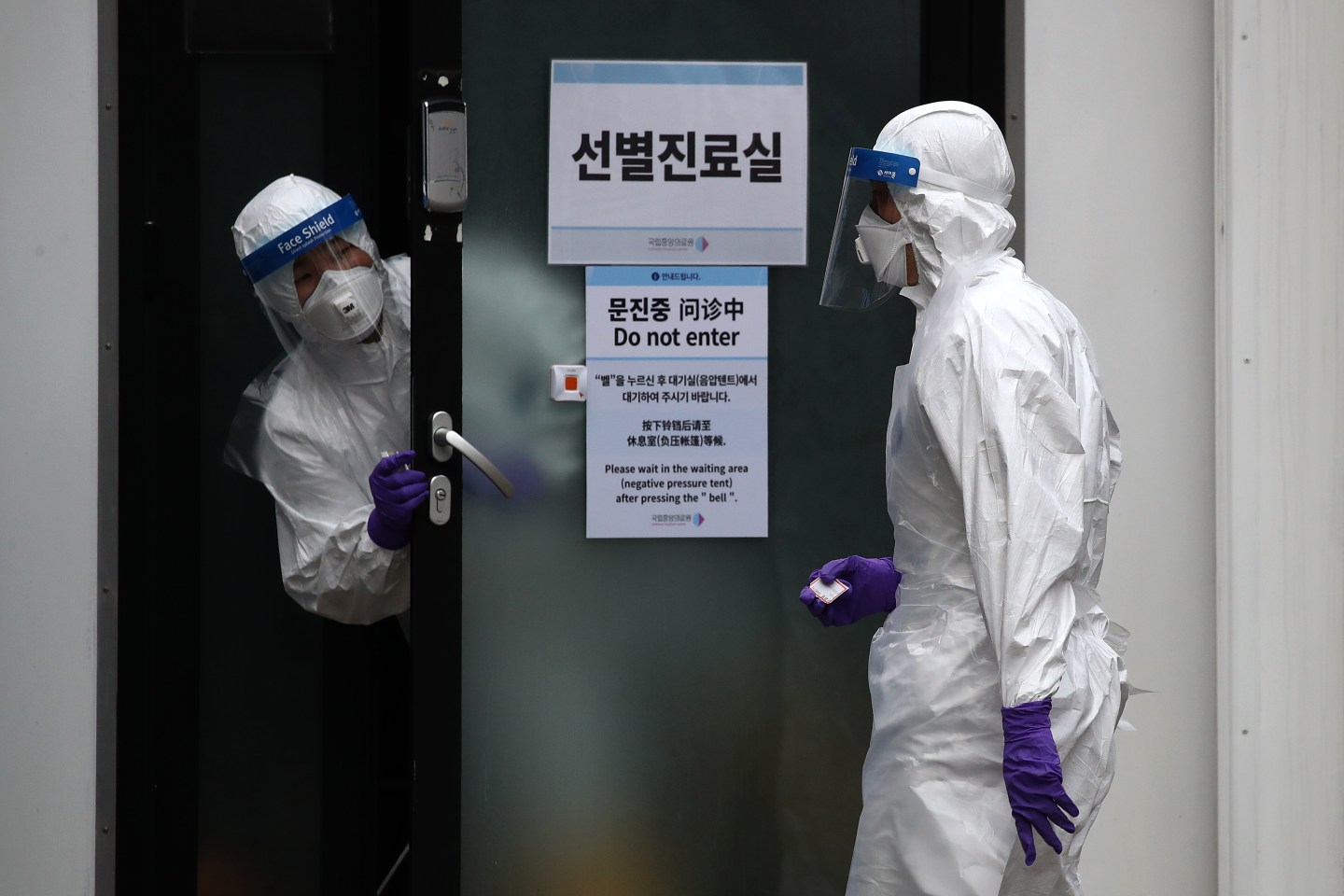 SEOUL, SOUTH KOREA - FEBRUARY 24: A disinfection professional wears protective gear spray anti-septic solution against the coronavirus (COVID-19) at a National Assembly on February 24, 2020 in Seoul, South Korea. The National Assembly called off its plenary session and temporarily closed its buildings after it was learned that a coronavirus patient attended a parliamentary forum last week. Government has raised the coronavirus alert to the "highest level" as confirmed case numbers keep rising. Government reported 231 new cases of the coronavirus (COVID-19) bringing the total number of infections in the nation to 833, with the potentially fatal illness spreading fast across the country. (Photo by Chung Sung-Jun/Getty Images)