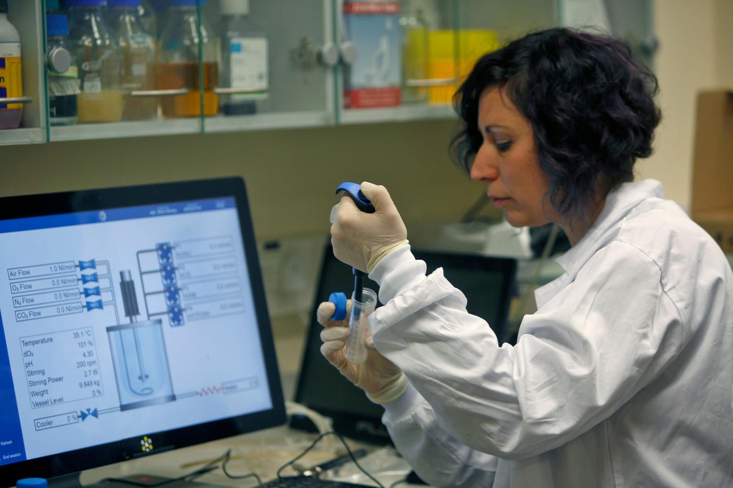 An Israeli scientist works on a coronavirus vaccine in a laboratory.