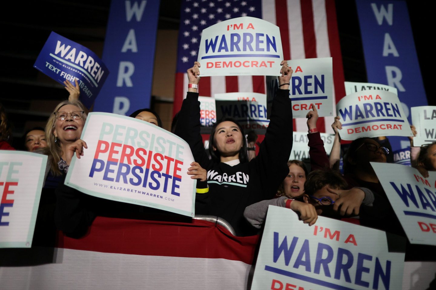 Supporters listen as U.S. Democratic Presidential Candidate Elizabeth Warren speaks at a rally at East Los Angeles College in Los Angeles, California, U.S., March 2, 2020.
