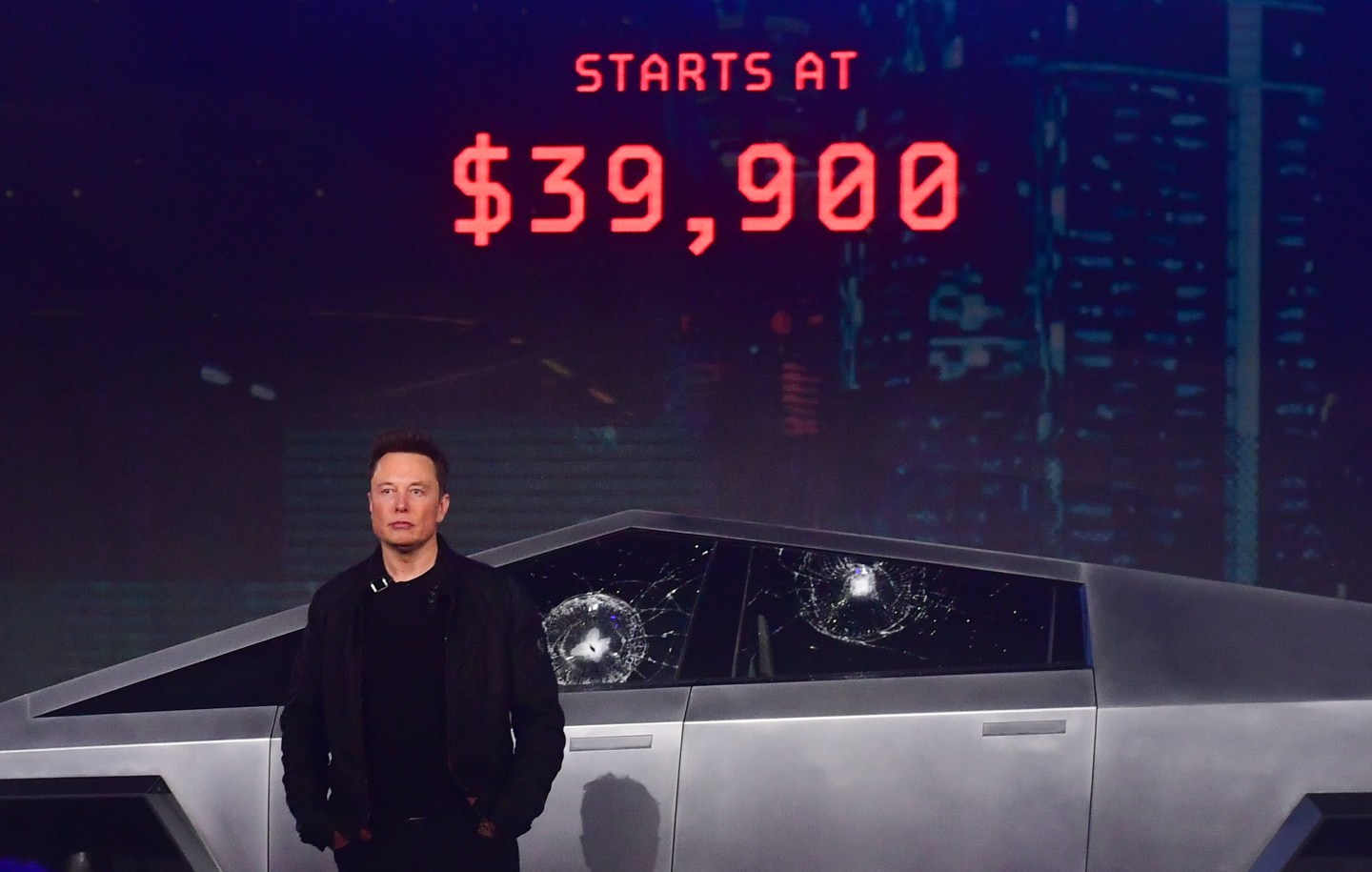 Tesla co-founder and CEO Elon Musk stands in front of the newly unveiled all-electric battery-powered Tesla's Cybertruck at Tesla Design Center in Hawthorne, Calif. on Nov. 21, 2019.