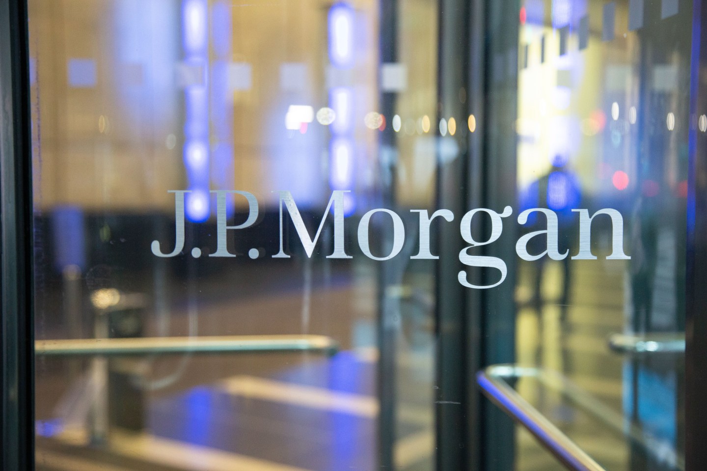 The J.P. Morgan logo sign on the entrance of a glass office building in Midtown Manhattan, New York, USA on 23 January 2020. JPMorgan Chase &amp; Co. is an American multinational investment bank and financial services holding company has the headquarters in New York City. NY, USA (Photo by Nicolas Economou/NurPhoto via Getty Images)