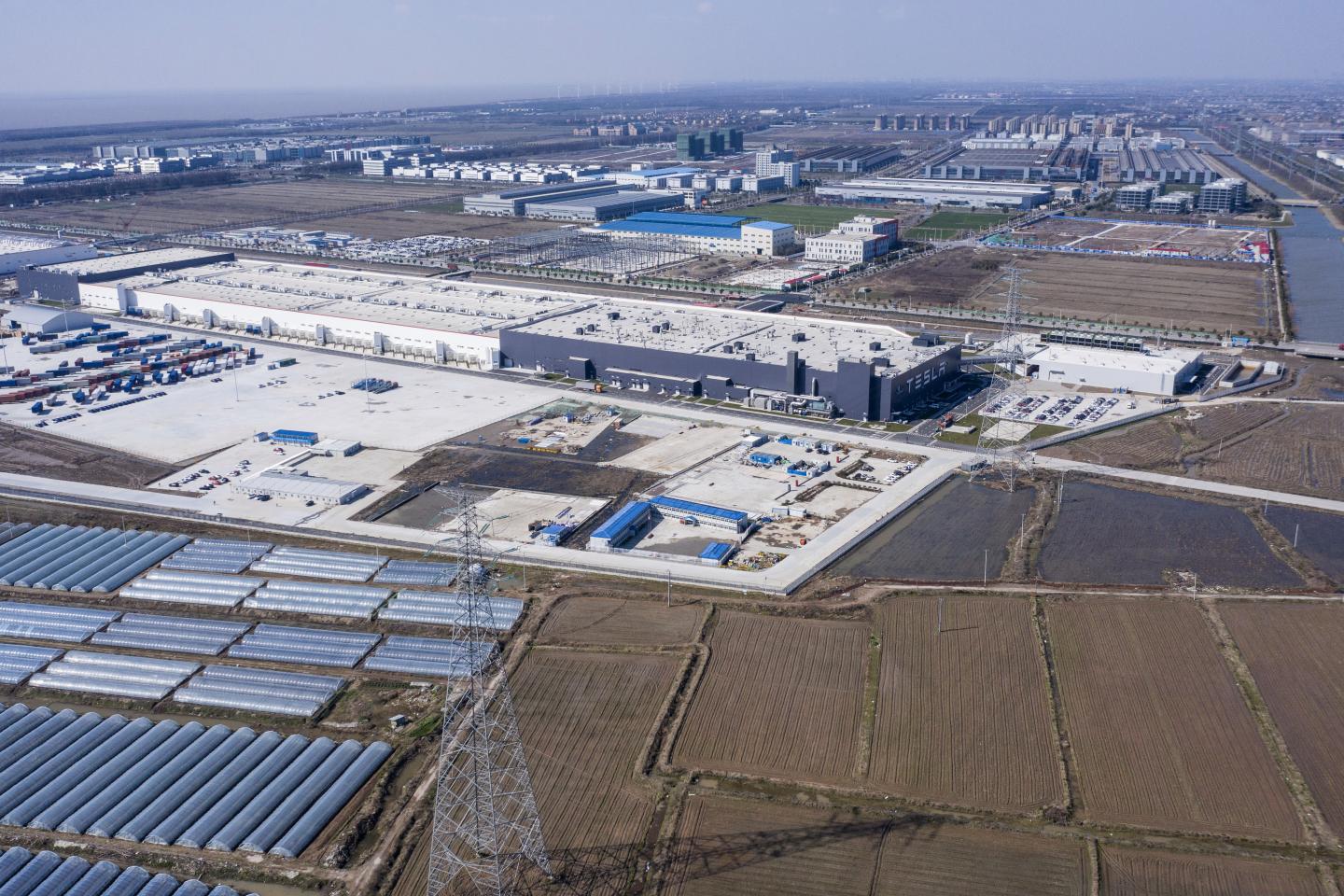The Tesla Inc. Gigafactory stands in this aerial photograph taken in Shanghai, China, on Monday, Feb. 17, 2020. Tesla has fully resumed deliveries of its China-built model 3 sedans, according to a company representative, after a pause due to the coronavirus outbreak. Photographer: Qilai Shen/Bloomberg via Getty Images