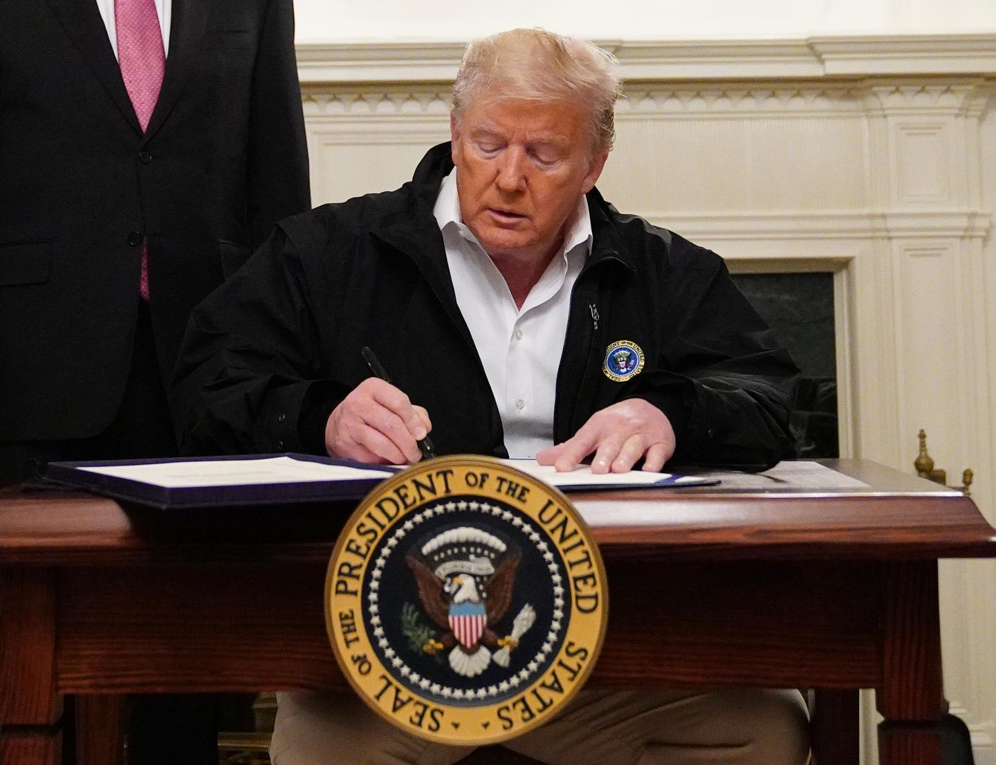 Trump signs coronavirus bill
