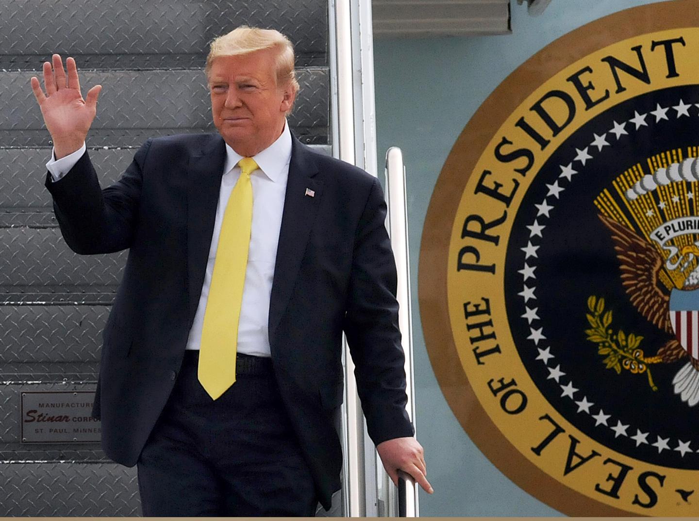 U.S. President Donald Trump waves as he arrives on Air Force One at Orlando Sanford International Airport on March 9, 2020 in Sanford, Florida. Trump is scheduled to attend a private fundraiser in the area. (Photo by Paul Hennessy/NurPhoto via Getty Images)