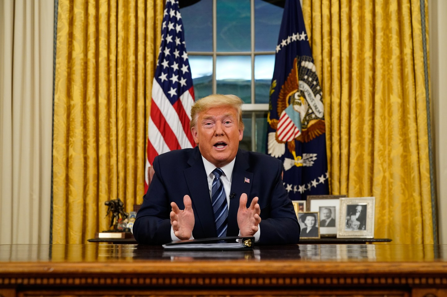 WASHINGTON, DC - MARCH 11: US President Donald Trump addresses the nation from the Oval Office about the widening Coronavirus crisis on March 11, 2020 in Washington, DC.