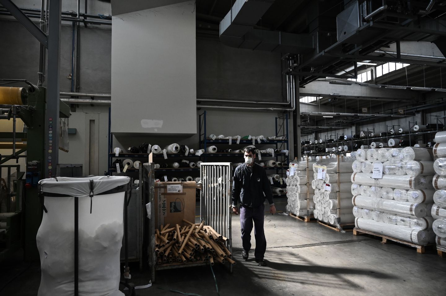 Masks and hand sanitizer replace iPhones and perfume: Firms redeploy factories to make coronavirus supplies