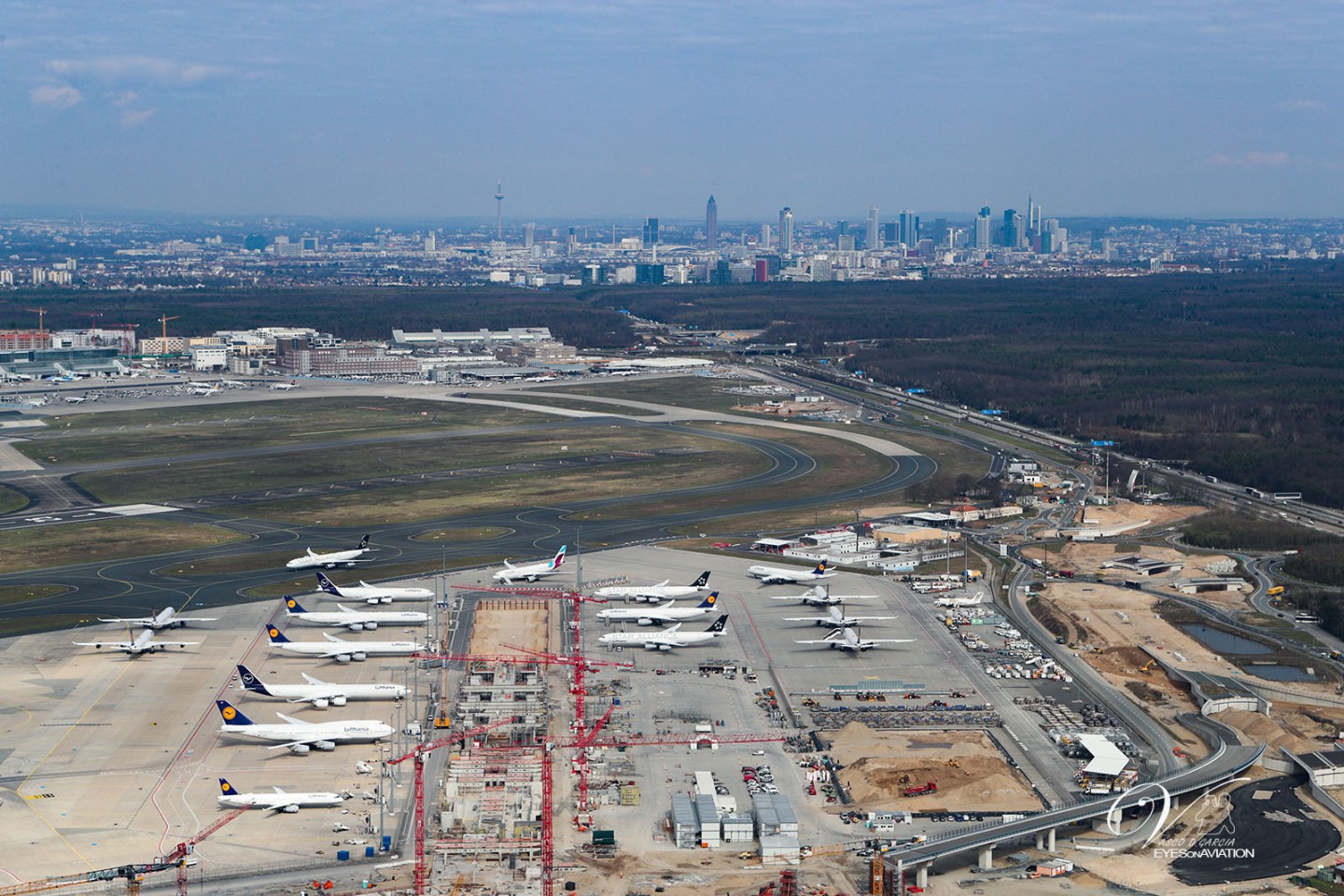 Unused Lufthansa aircraft sit next to the taxiways of the airport in Frankfurt, Germany on March 18, 2020.