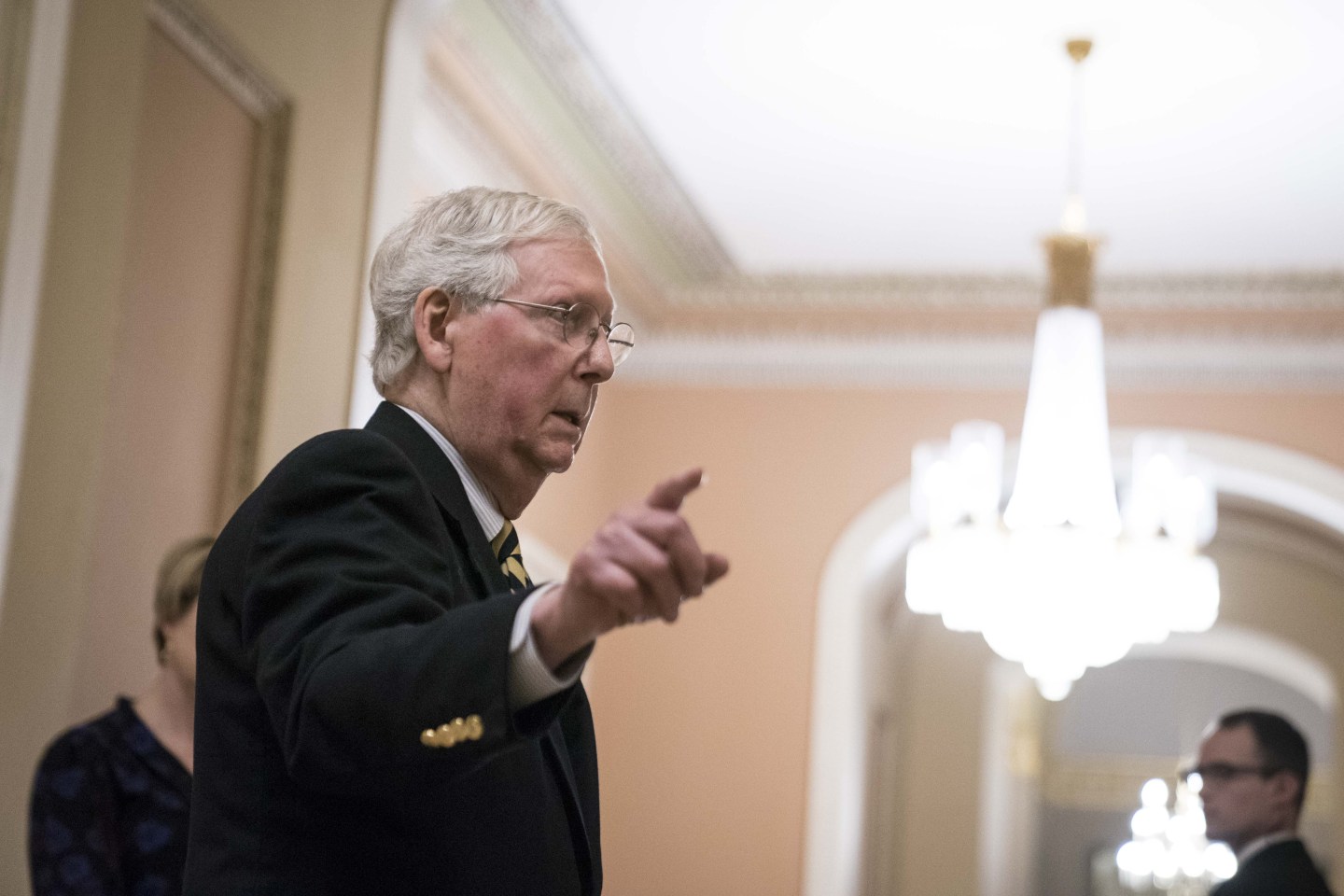 Senate Majority Leader Mitch McConnell, a Republican from Kentucky, left, speaks to members of the media in the U.S. Capitol in Washington, D.C., U.S., on Sunday, March 22, 2020. Senate Democrats blocked McConnell's attempt to advance a coronavirus economic rescue package Sunday after leaders in both chambers disagreed on how to spend nearly $2 trillion. Photographer: Sarah Silbiger/Bloomberg via Getty Images