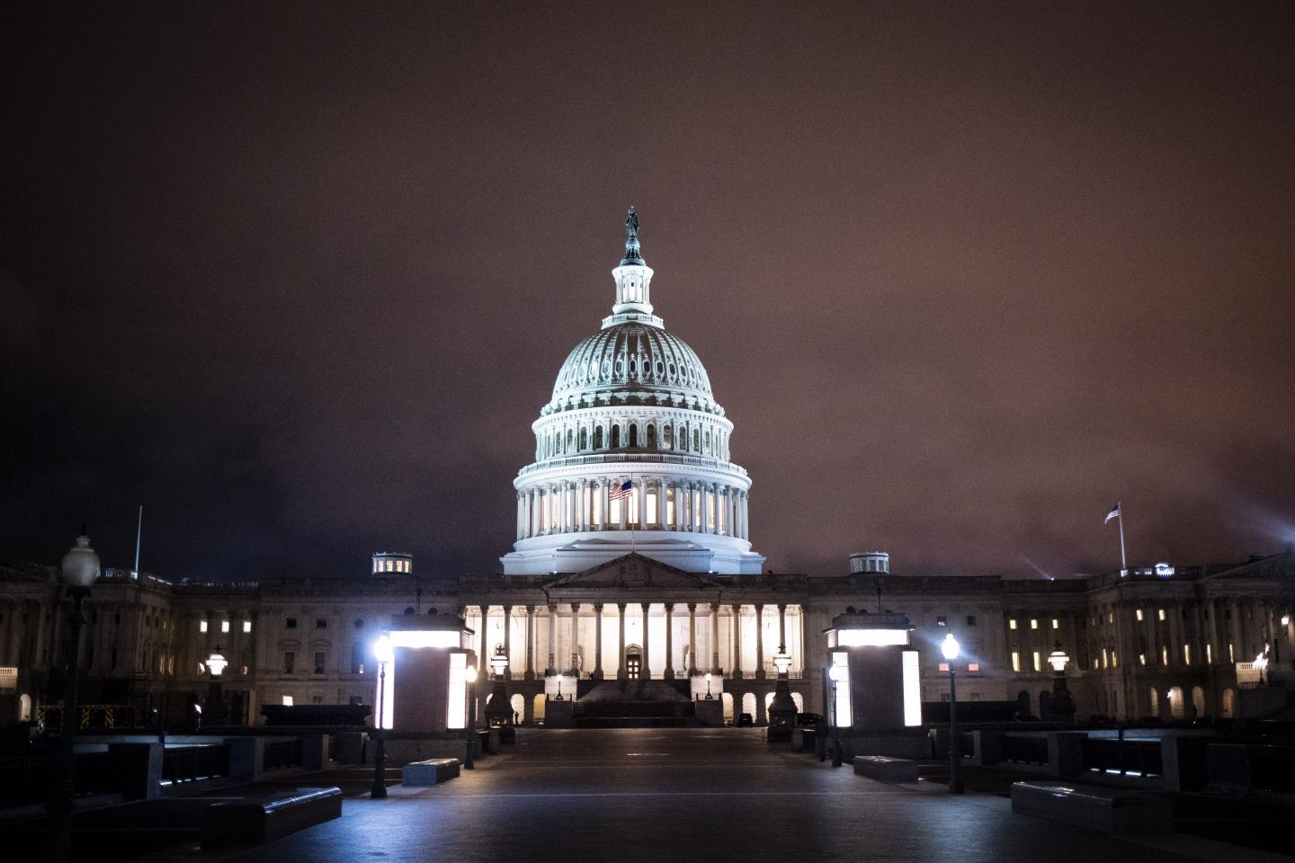 The U.S. Capitol building stands illuminated at night in Washington, D.C., U.S., on Wednesday, March 25, 2020. The U.S. Senate approved a historic $2 trillion rescue plan to respond to the economic and health crisis caused by the coronavirus pandemic, putting pressure on the Democratic-led House to pass the bill quickly and send it to President Donald Trump for his signature. Photographer: Al Drago/Bloomberg via Getty Images