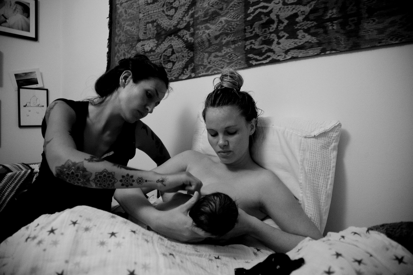 Doula and Carriage House Birth founder Domino Kirke, left, with a client. Doulas are rethinking what their work can look like amid the coronavirus pandemic.