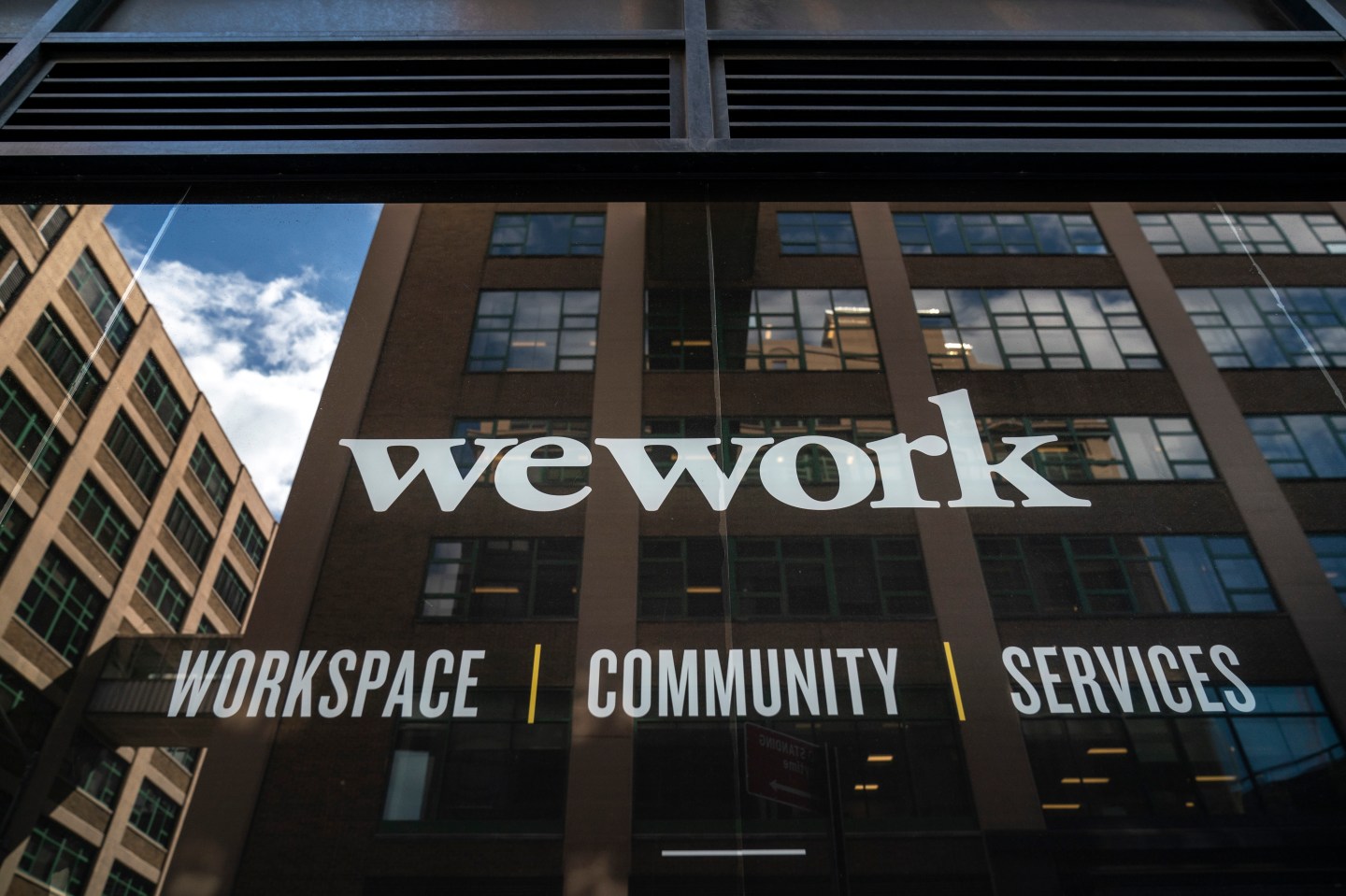 NEW YORK, NY - SEPTEMBER 13: A WeWork office facility stands in the DUMBO neighborhood in the Brooklyn borough of New York City on September 13, 2019. WeWork has chosen to list their IPO on the Nasdaq with a September 23 trading debut. The company is now considering a valuation of potentially less than $20 billion after being previously valued on the private market for as much as $47 billion. The company has also reduced CEO Adam Neumann's voting power after receiving sharp criticism of their corporate governance. (Photo by Drew Angerer/Getty Images)