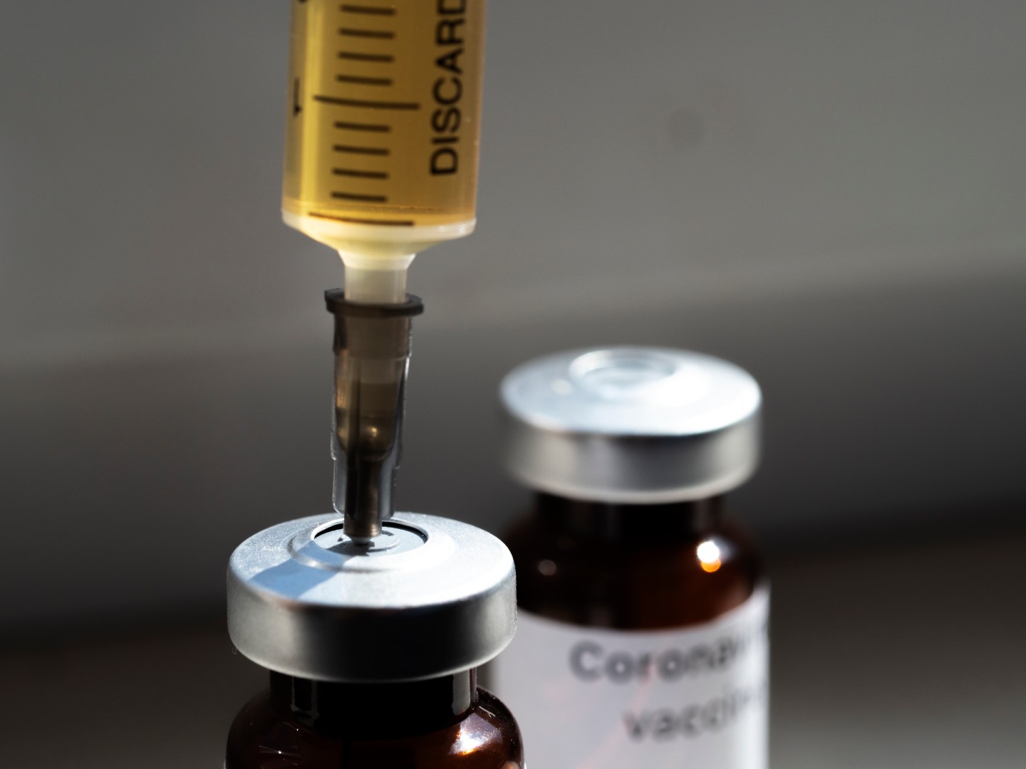 Sanofi will combine its experimental coronavirus vaccine with GlaxoSmithKline Plc’s adjuvant technology, which may allow more doses of a shot to be produced.