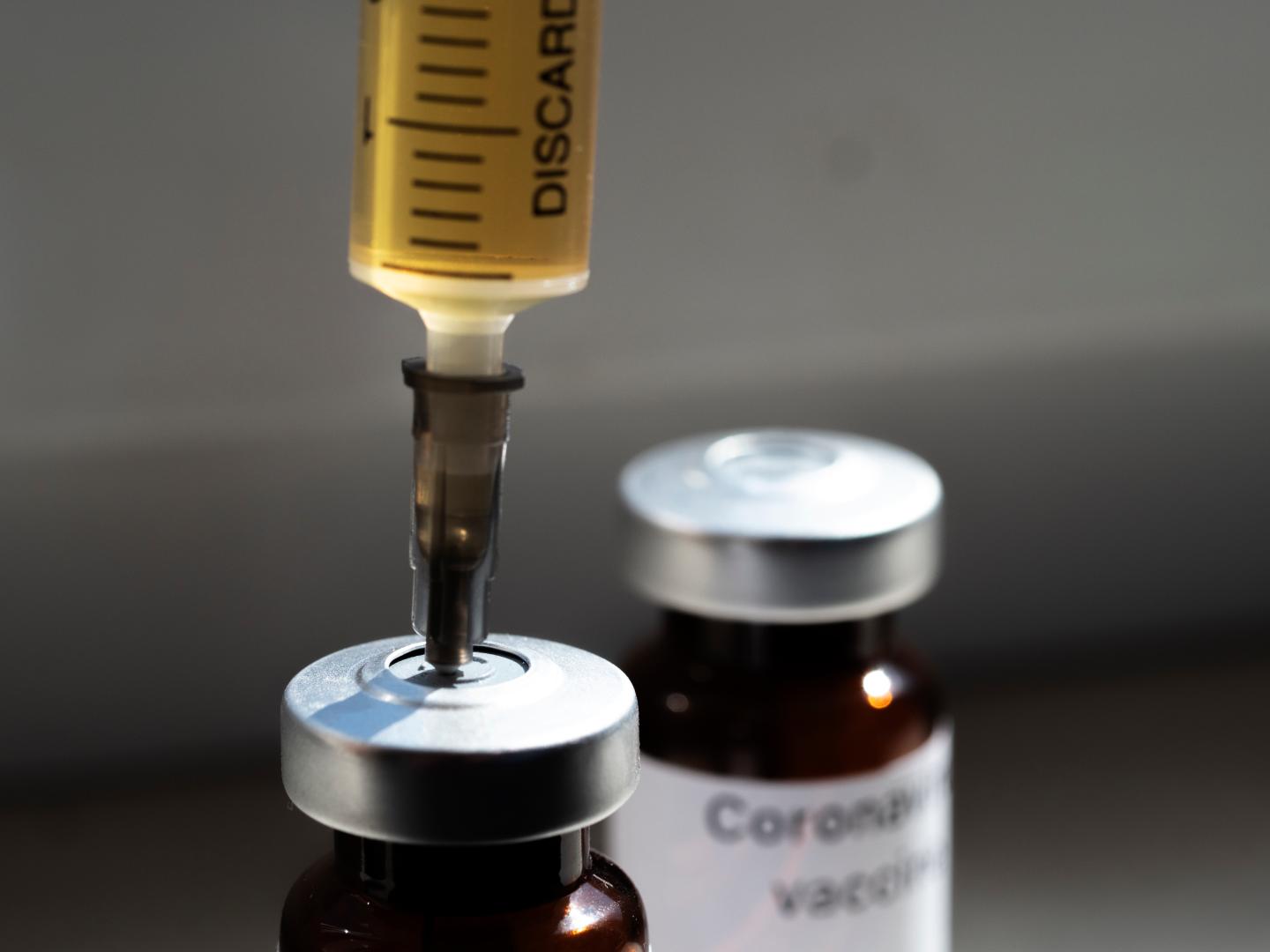 Sanofi will combine its experimental coronavirus vaccine with GlaxoSmithKline Plc’s adjuvant technology, which may allow more doses of a shot to be produced.