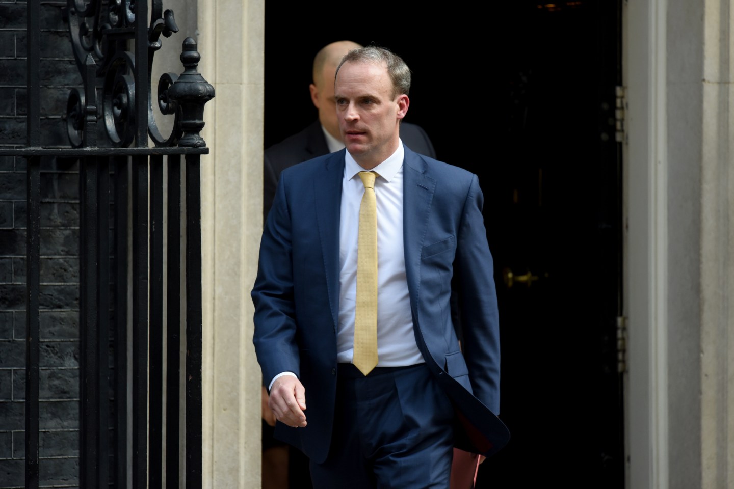 LONDON, ENGLAND - APRIL 07: British Foreign Secretary Dominic Raab leaves 10 Downing Street after today's coronavirus (COVID-19) committee meeting on April 7, 2020 in London, United Kingdom. British Prime Minister Boris Johnson was admitted to intensive care Monday evening as his condition deteriorated since being infected with the novel coronavirus. (Photo by Kate Green/Anadolu Agency via Getty Images)
