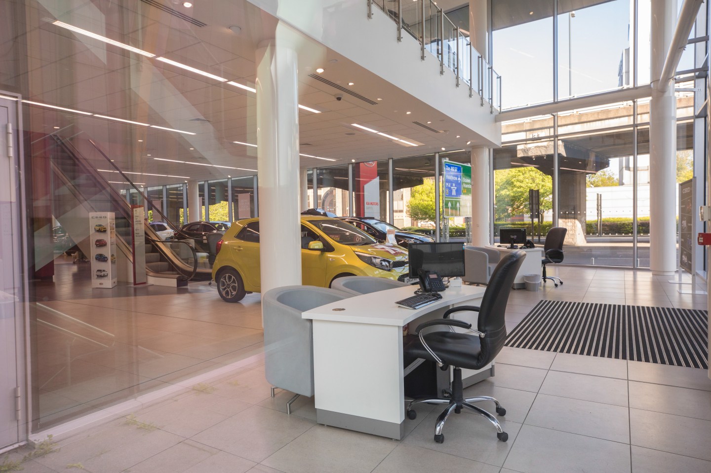 An empty office chair sits in a Kia Motors Corp. automobile showroom in London, U.K. on Monday, April 20, 2020. European car sales dropped the most on record in March as showrooms closed to help limit the coronavirus outbreak and production shut down across the continent.