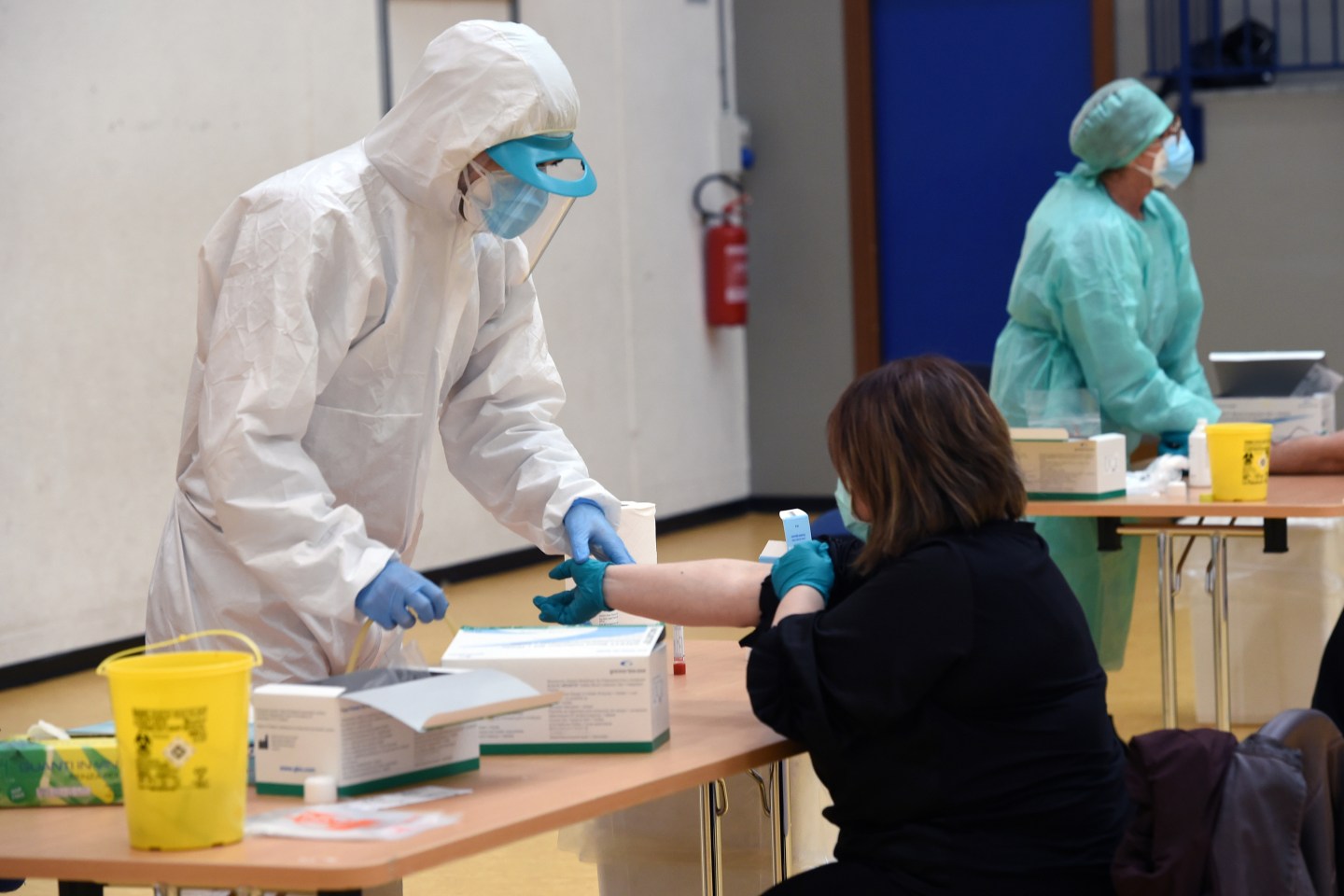A healthcare professional performs a serological test that can identify who has contracted Coronavirus, perhaps in an asymptomatic form and has produced antibodies, on April 20, 2020 in Milan, Italy.