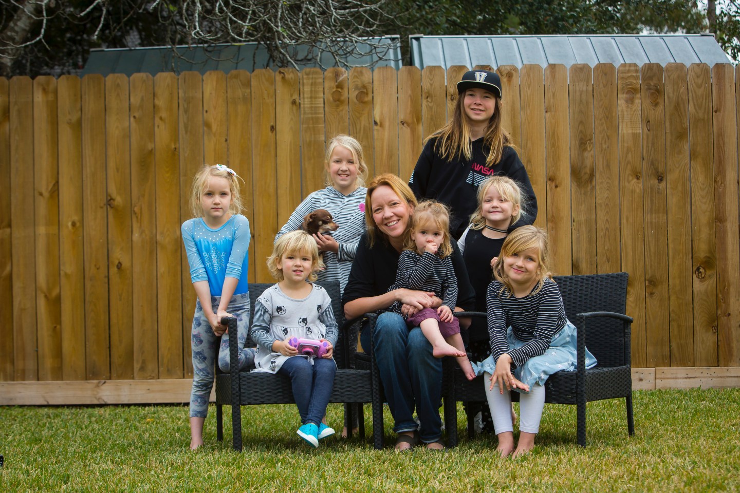 Houston Chronicle editor Jennifer Radcliffe, with her seven children. Annie Mulligan