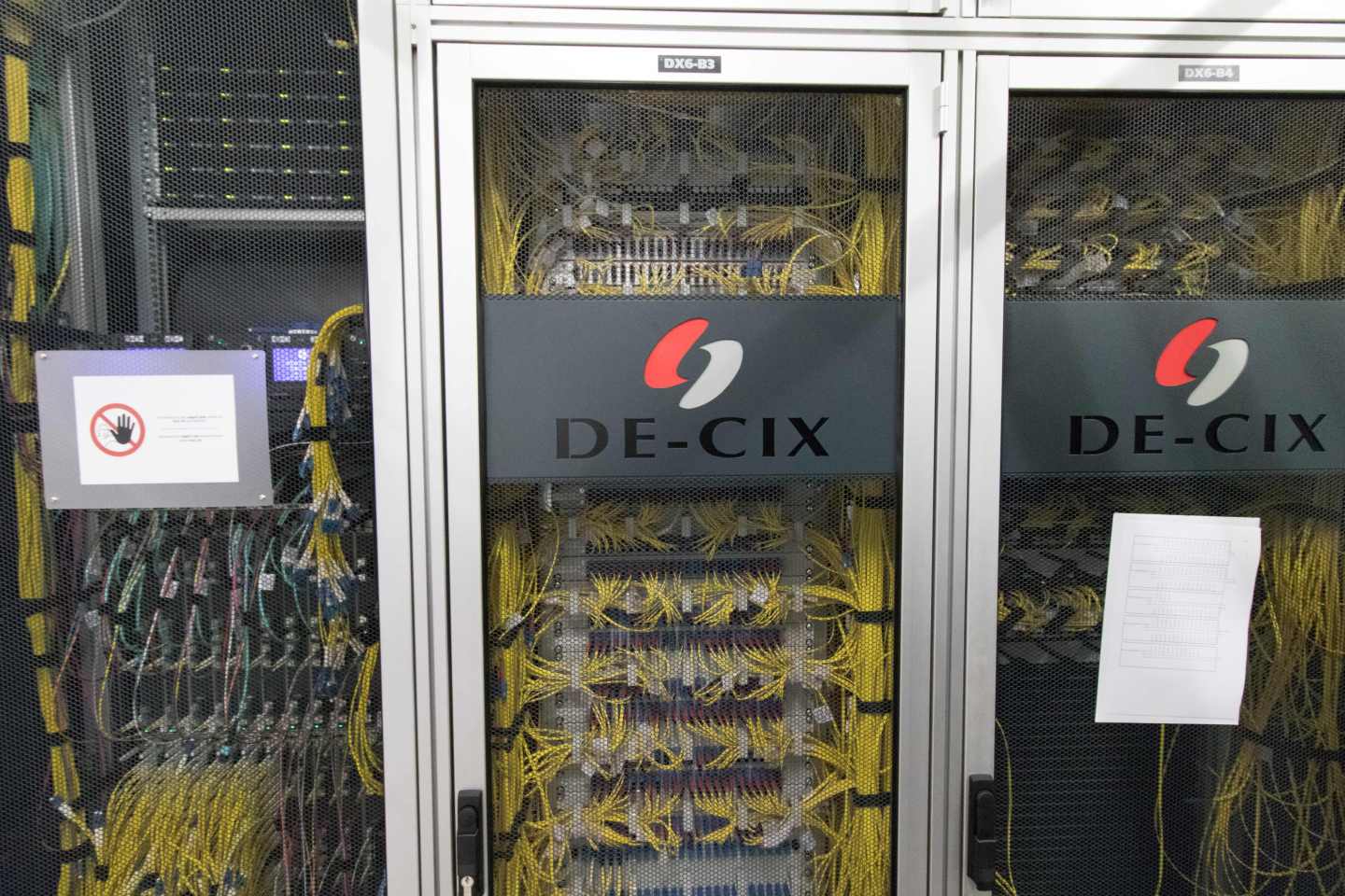 A picture taken on July 25, 2018 shows the logo of the internet exchange point DE-CIX (Deutscher Commercial Internet Exchange) on servers at a data center in Frankfurt am Main, western Germany.