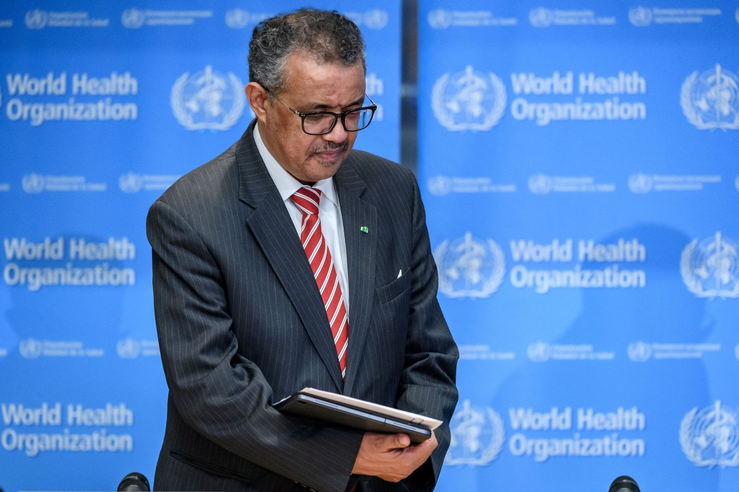 How is the World Health Organization fighting COVID-19, and why is Trump threatening to defund it?