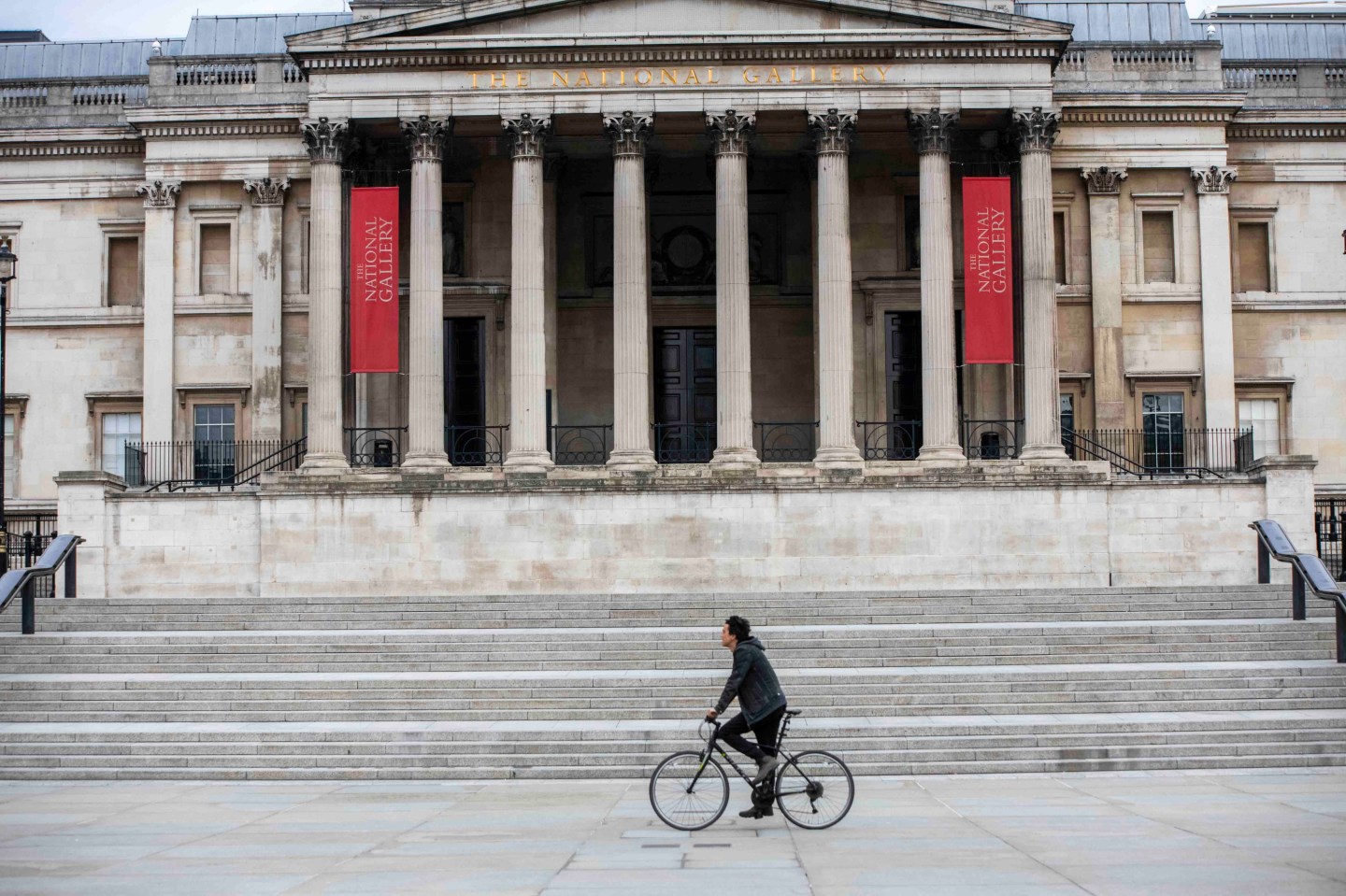 LONDON, ENGLAND - APRIL 27: Man cycling in front of The National Gallery on April 27, 2020 in London, UK during the coronavirus pandemic. (Photo by Erica Dezonne/PxImages/Icon Sportswire via Getty Images)