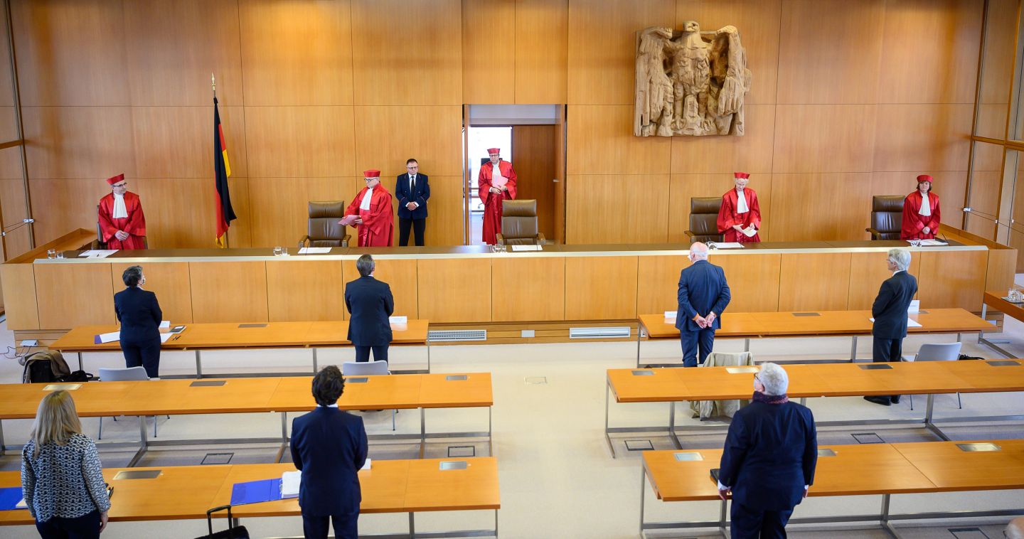 The judges of the German constitutional court (L-R) Ulrich Maidowski, Peter M. Huber, chairman Andreas Vosskuhle, Doris König and Christine Langenfeld arrive on May 5, 2020 at the Constitutional court in Karlsruhe, togive out their ruling that the European Central Bank must clarify a key bond-buying scheme to support the eurozone economy is "proportionate" or else Germany's Bundesbank central bank may no longer participate.