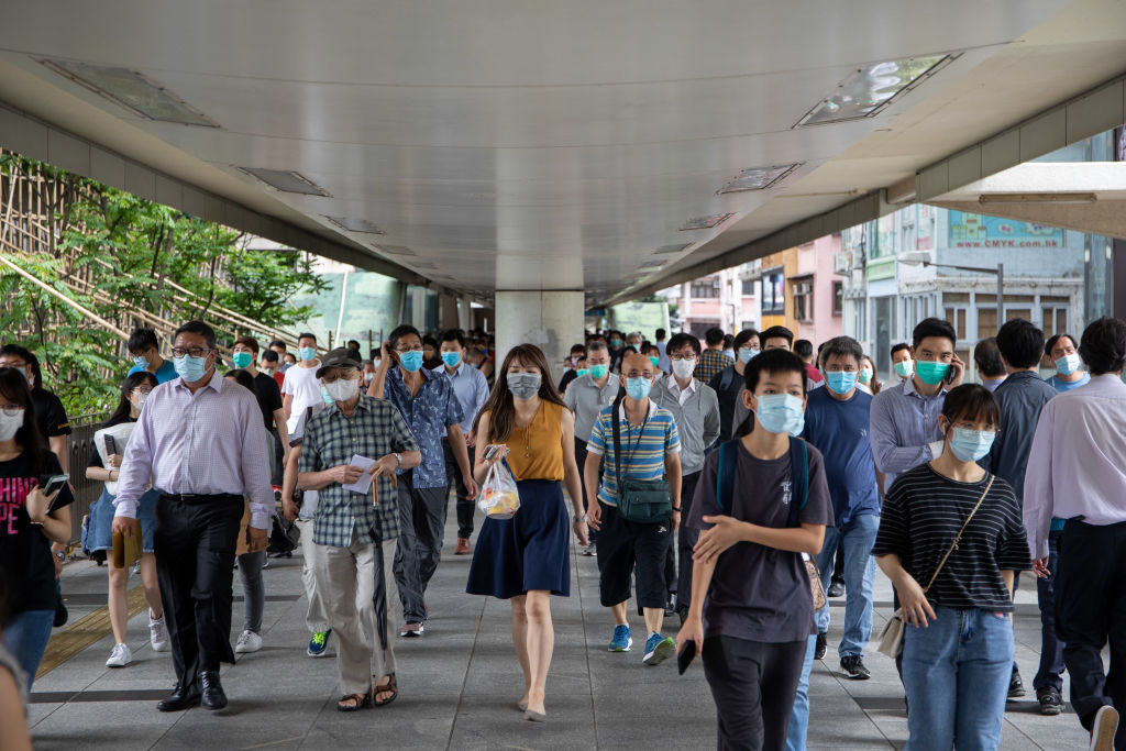 Hong Kong Parks and Commuters as Government Reopens Public Facilities on Dwindling Virus Cases