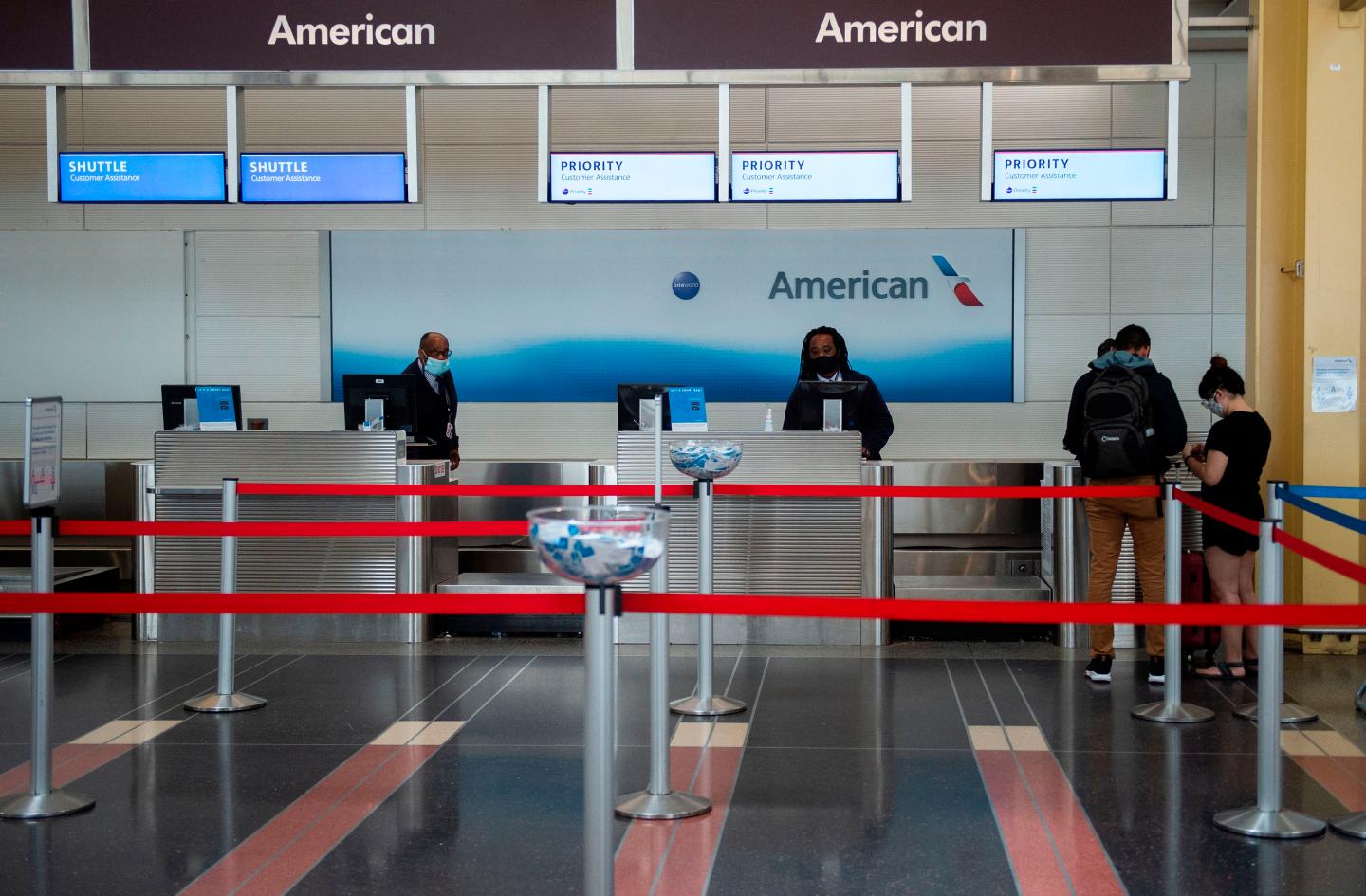 American Airlines to cut 30% of management and support staff amid travel decline