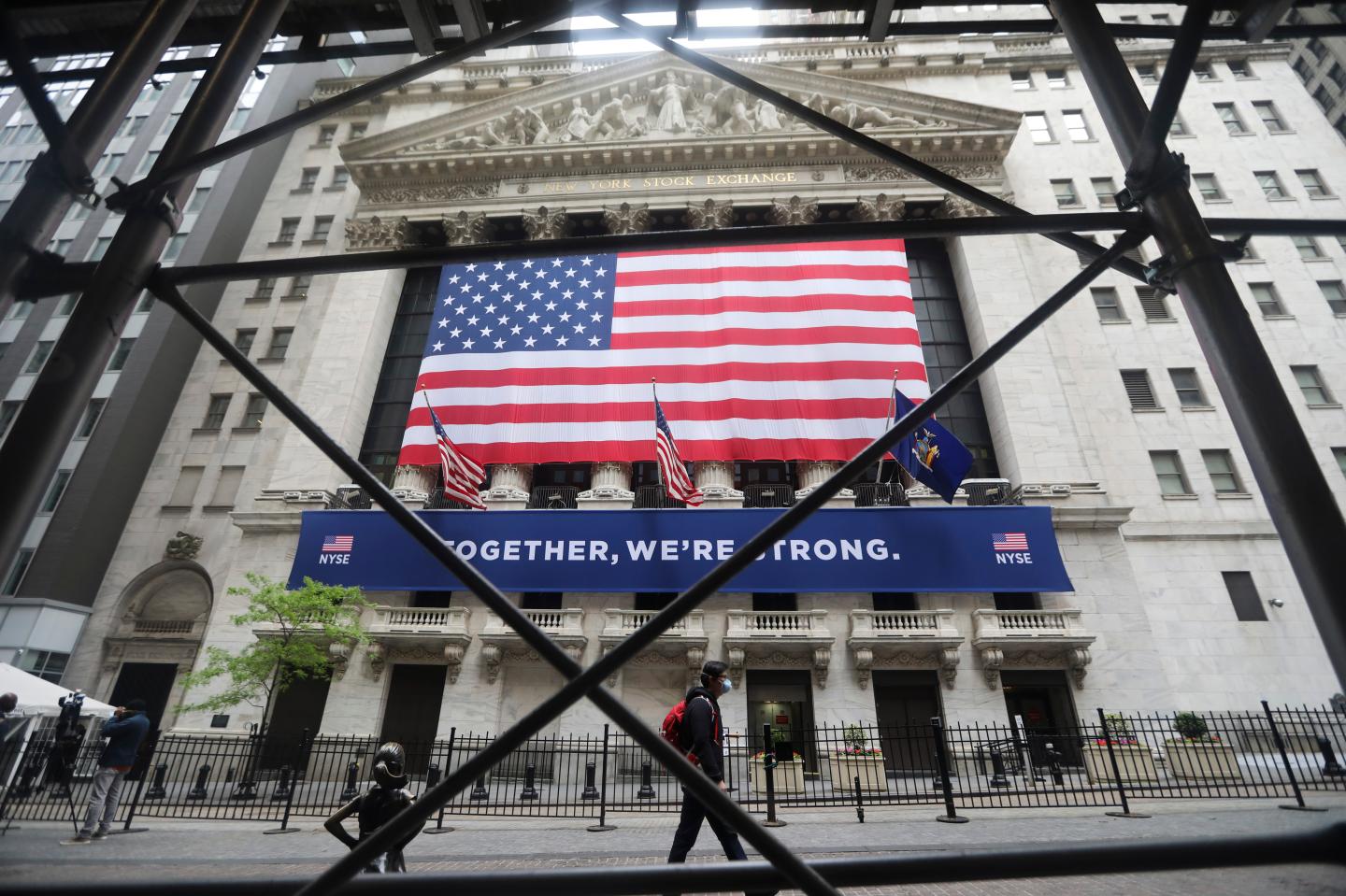 Stocks surge for a third day, S&P 500 closes above 3,000