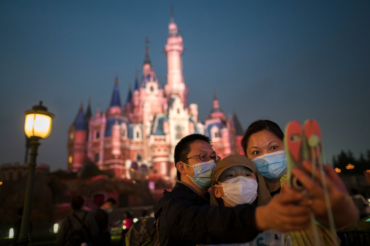 Tourists visit Shanghai Disneyland after its reopening on May 11, 2020 in Shanghai, China.