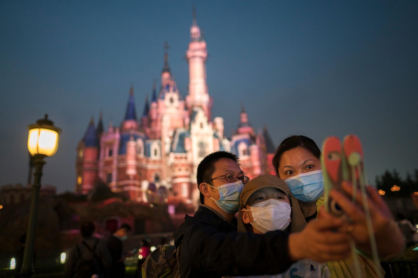 Tourists visit Shanghai Disneyland after its reopening on May 11, 2020 in Shanghai, China.