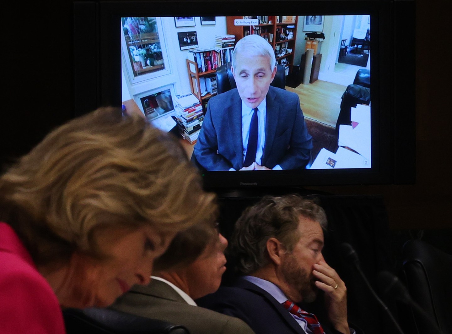 Senators listen to Dr. Anthony Fauci, director of the National Institute of Allergy and Infectious Diseases speak remotely during a Senate Health, Education, Labor and Pensions Committee hearing on Capitol Hill on May 12, 2020 in Washington, DC. The committee is hearing testimony from members of the White House Coronavirus Task Force on how to safely open the country and get America back to work and school.