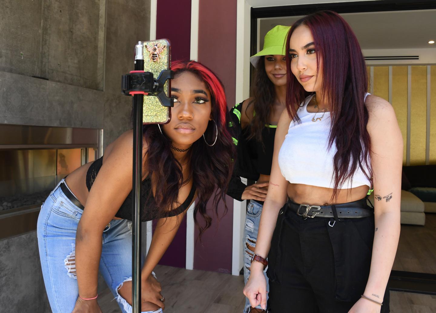 Left to right: TikTok influencers Bria Alana, Tanisha Coetzee, and Tianna Singer pose during An Afternoon With TikTok's "Girls In The Valley" on May 18, 2020 in Sherman Oaks, California.