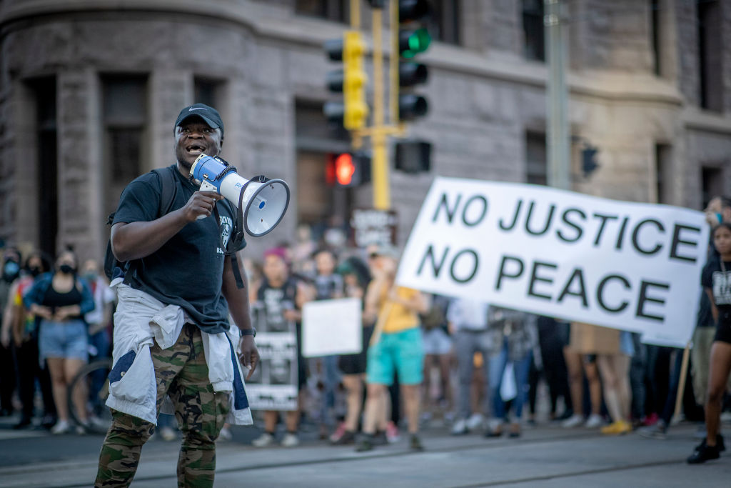 The third day of mourning and protesting and looting after the death of George Floyd in police custody