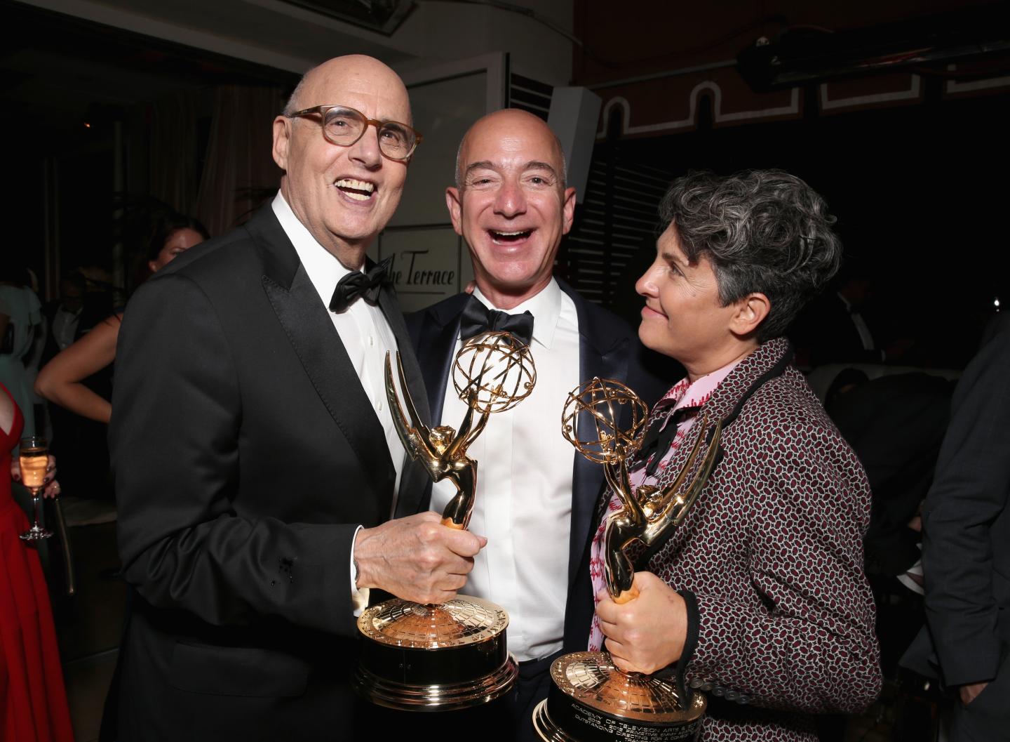 Actor Jeffrey Tambor, Amazon CEO Jeff Bezos, and writer/director Jill Soloway at Amazon's Emmy Celebration at the Sunset Tower Hotel in West Hollywood on September 18, 2016.
