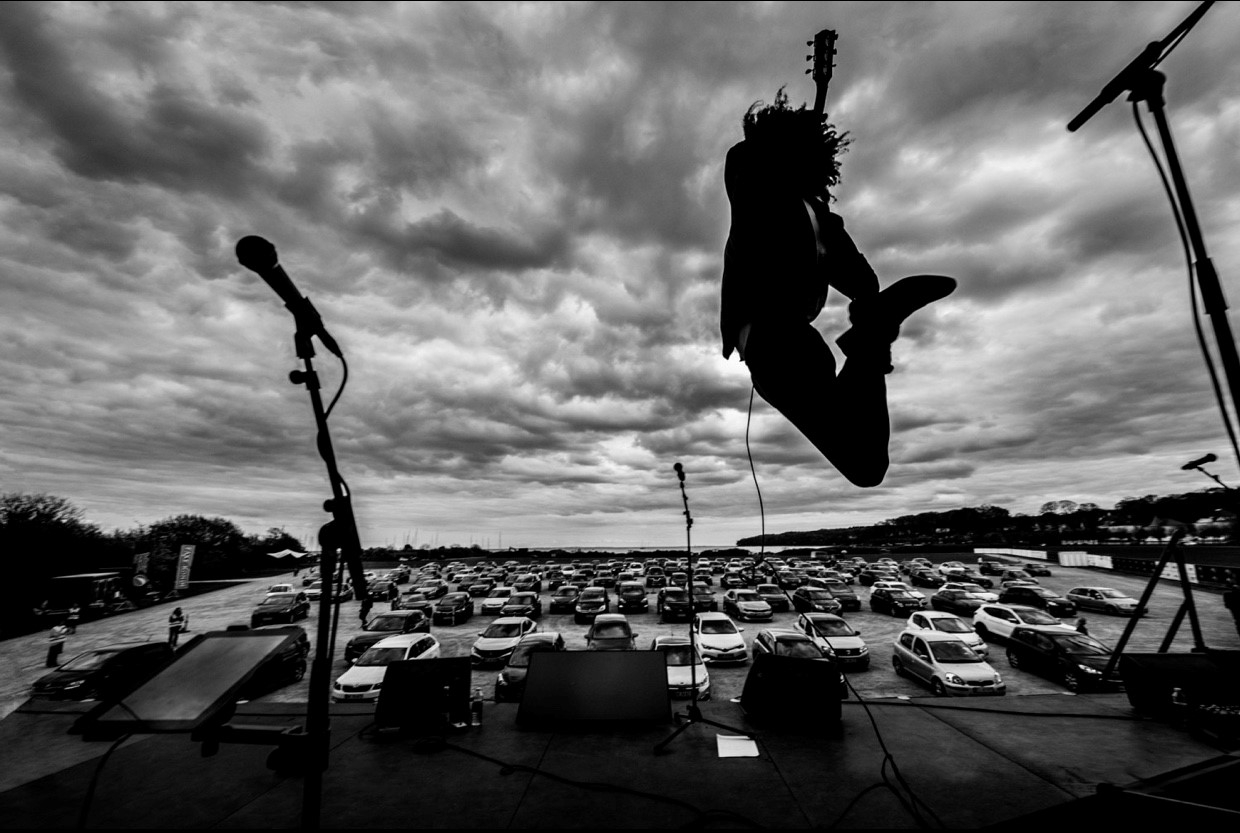 Danish singer-songwriter Thomas Buttenscön performs at the P scenen drive-in culture festival in Aarhus.